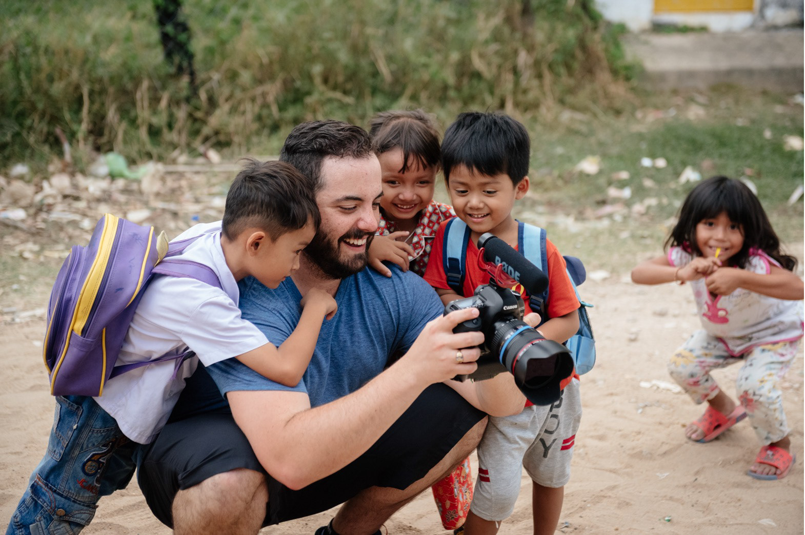 Dillon showing off some of his photos to children in Andong Village. These kids loved to goof off and have their picture taken!