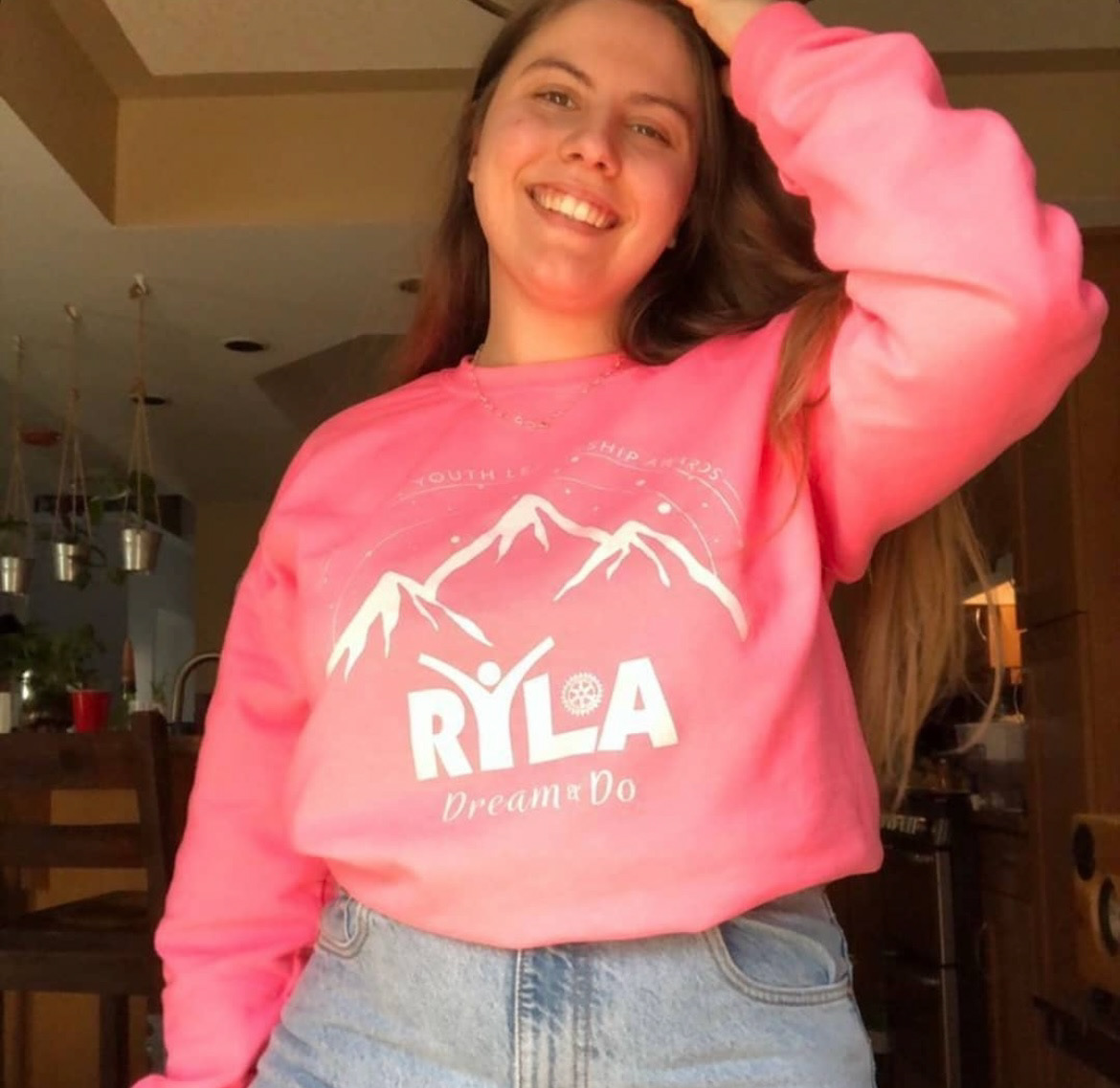 RYLA counsellor wearing custom Dream & Do sweater.