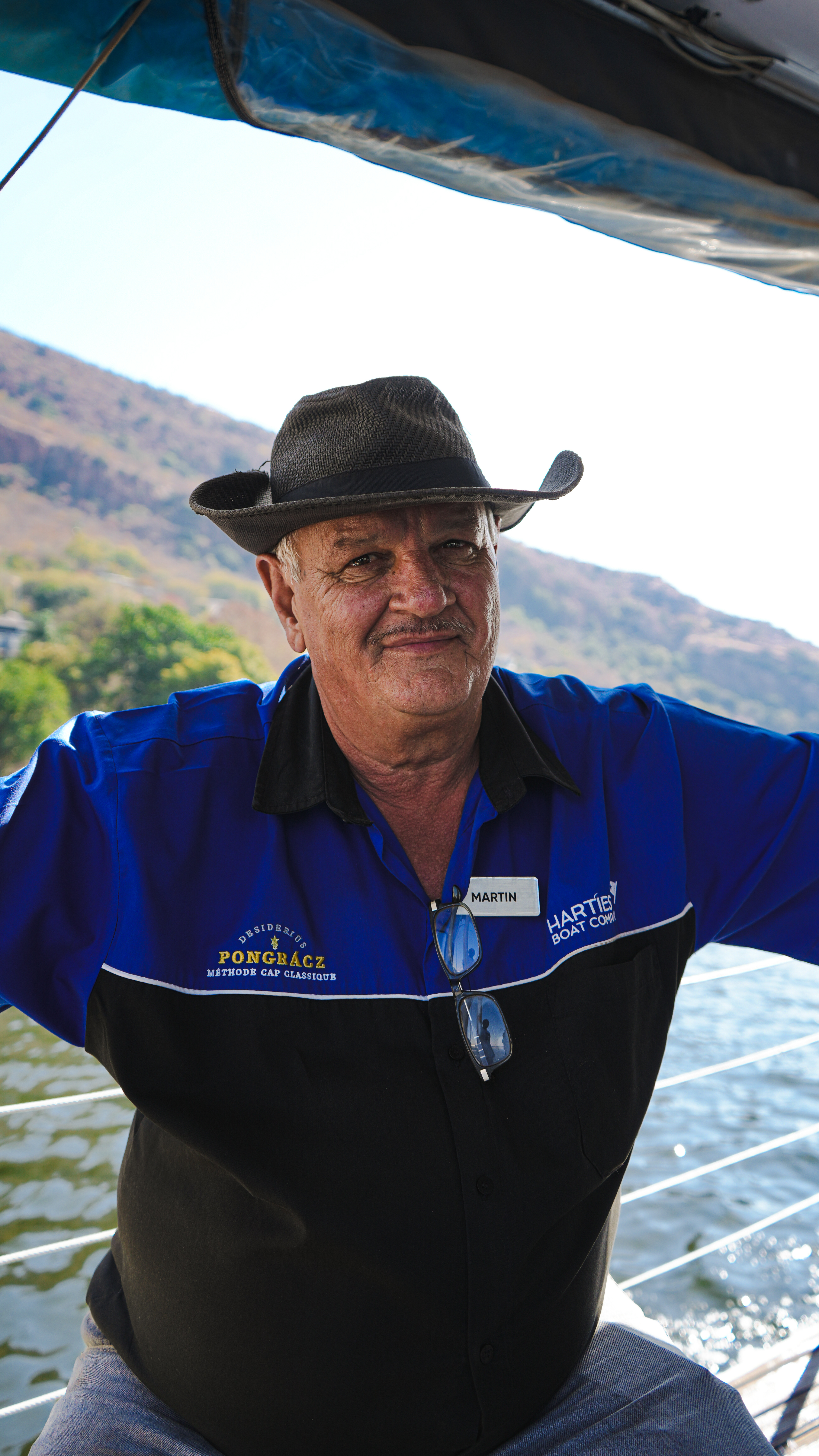 On Martin's boat, there are three rules: 1. The captain is always right, 2. Refer to rule number one, 3. Refer to rule number two. Hartbeespoort, South Africa.