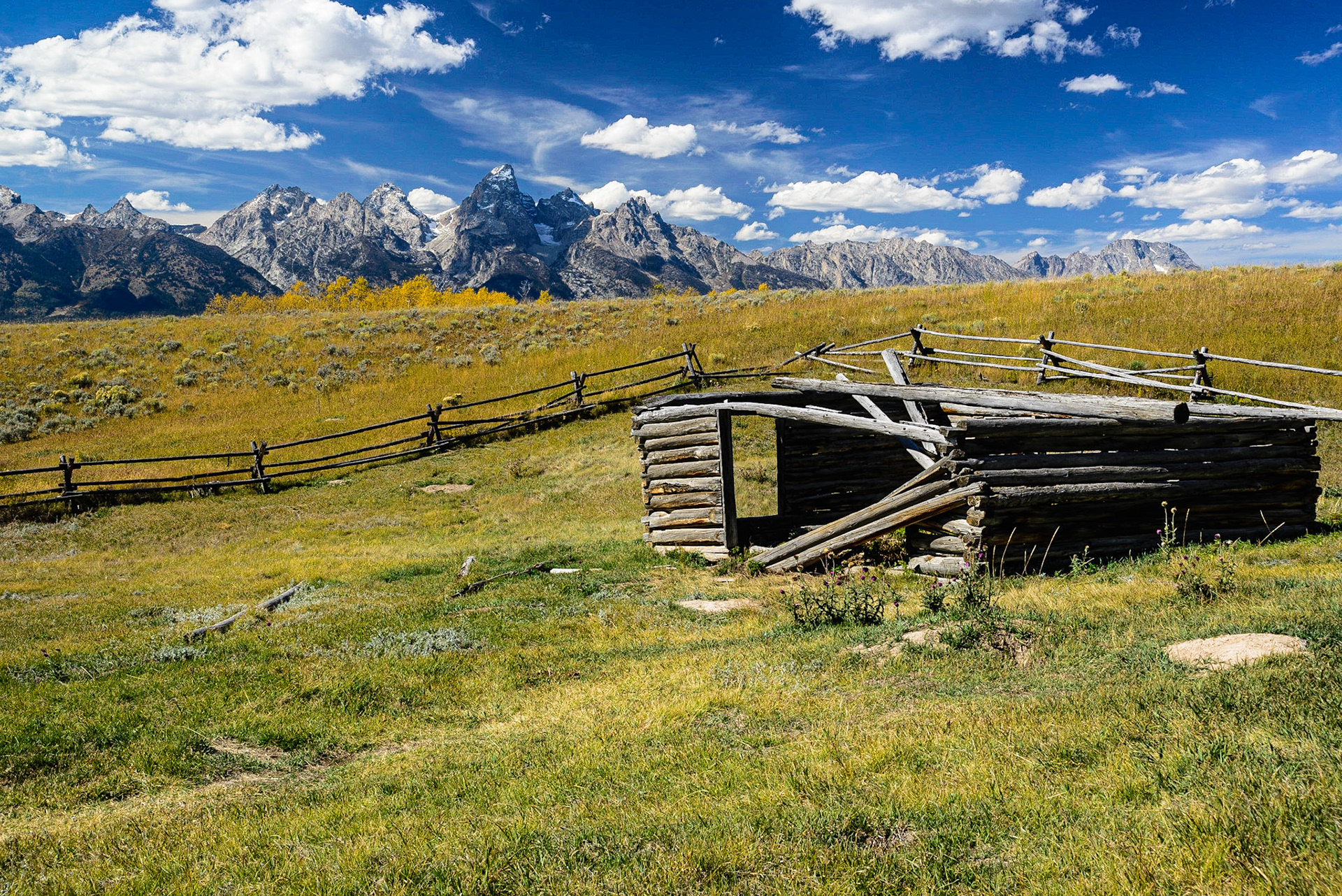 DTGD21200 Old Homestead Cabin looking at The Tetons