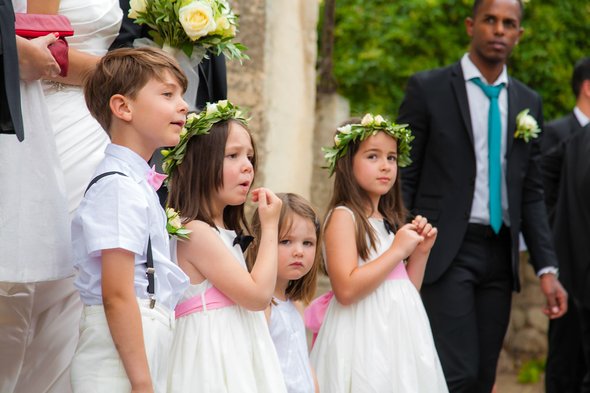 Children line up for photographs at a wedding in Eygalières, France.