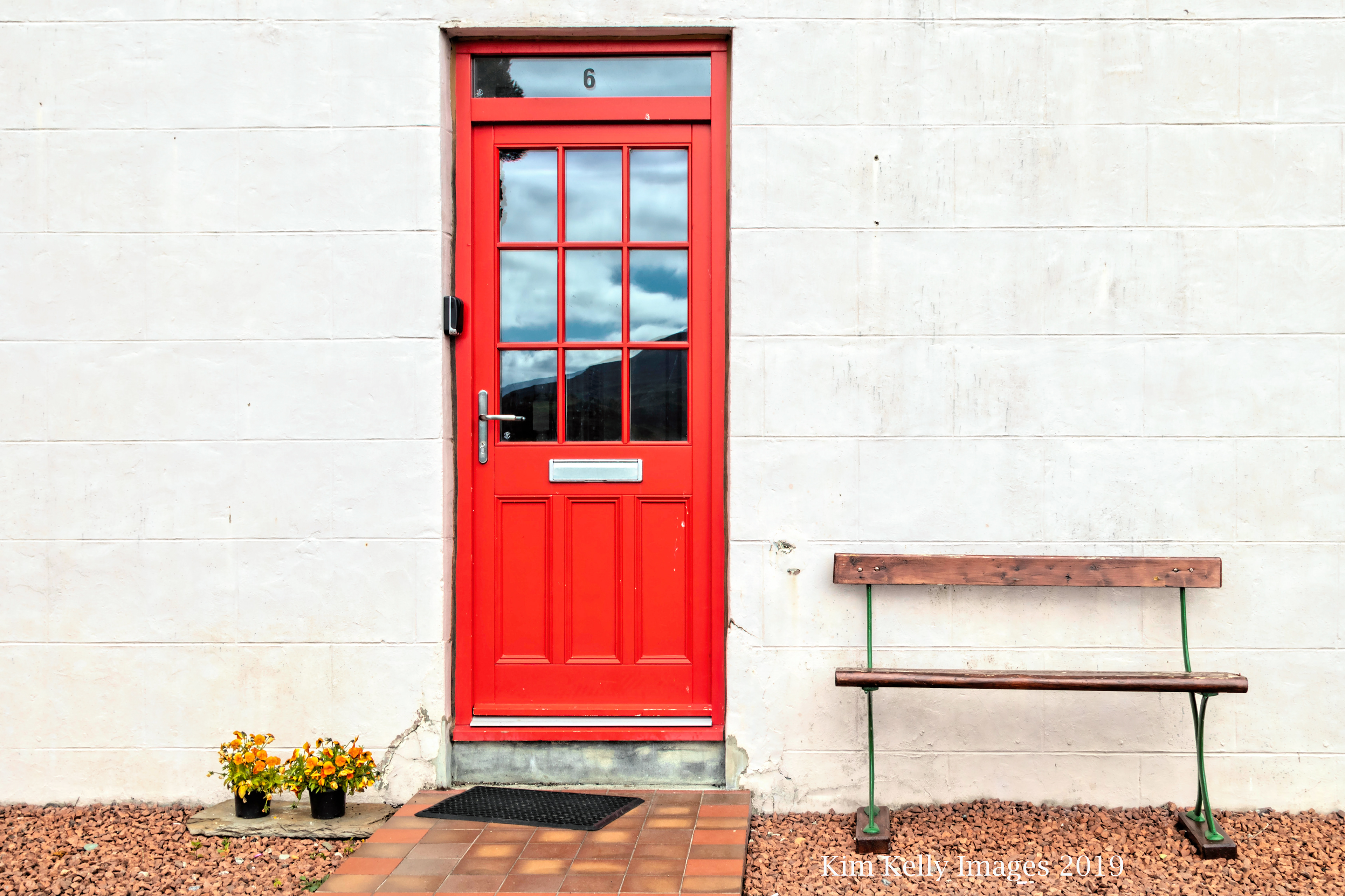 Red Door and a Bench