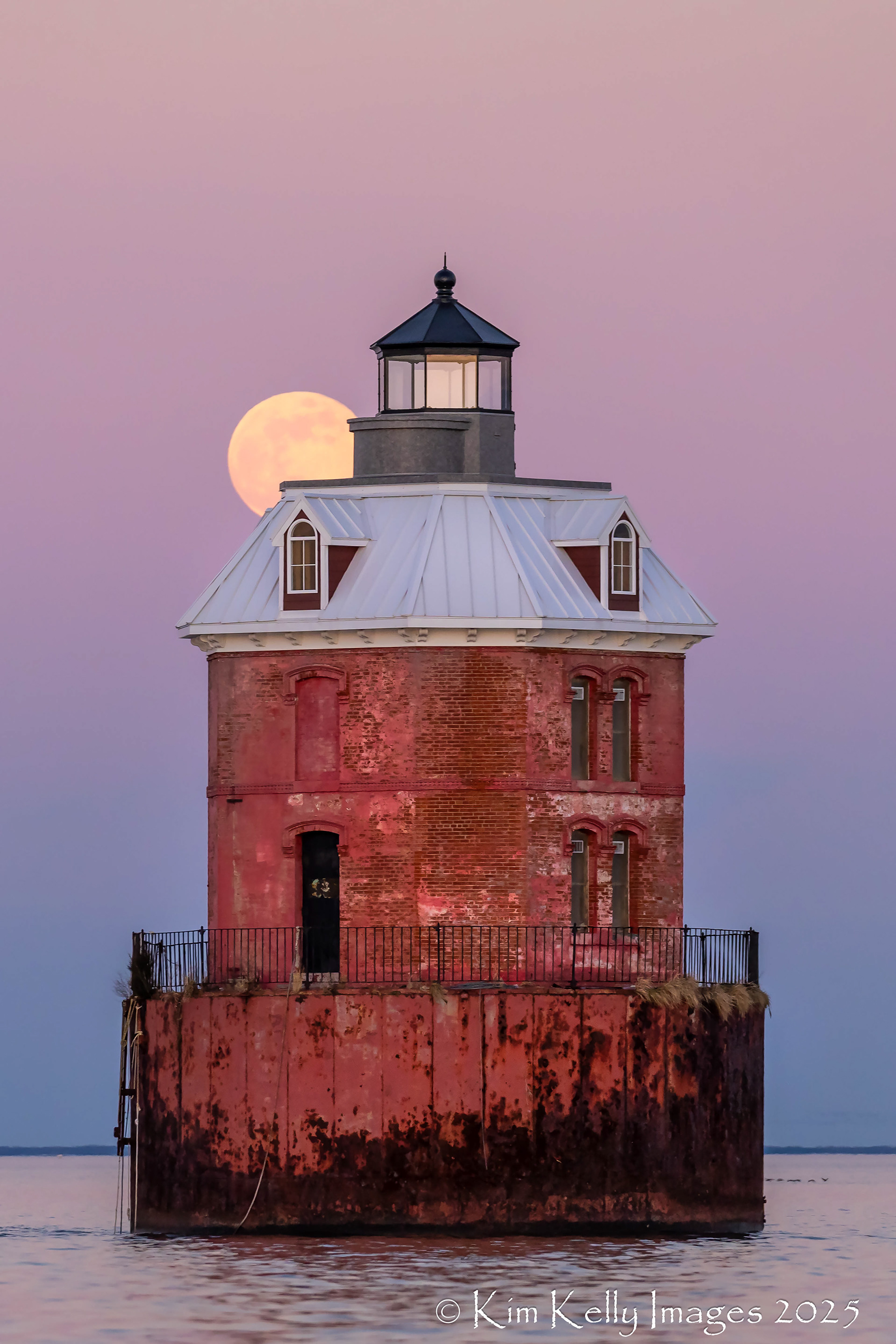 Full Moon Hiding Behind the Sandy Point Lighthouse