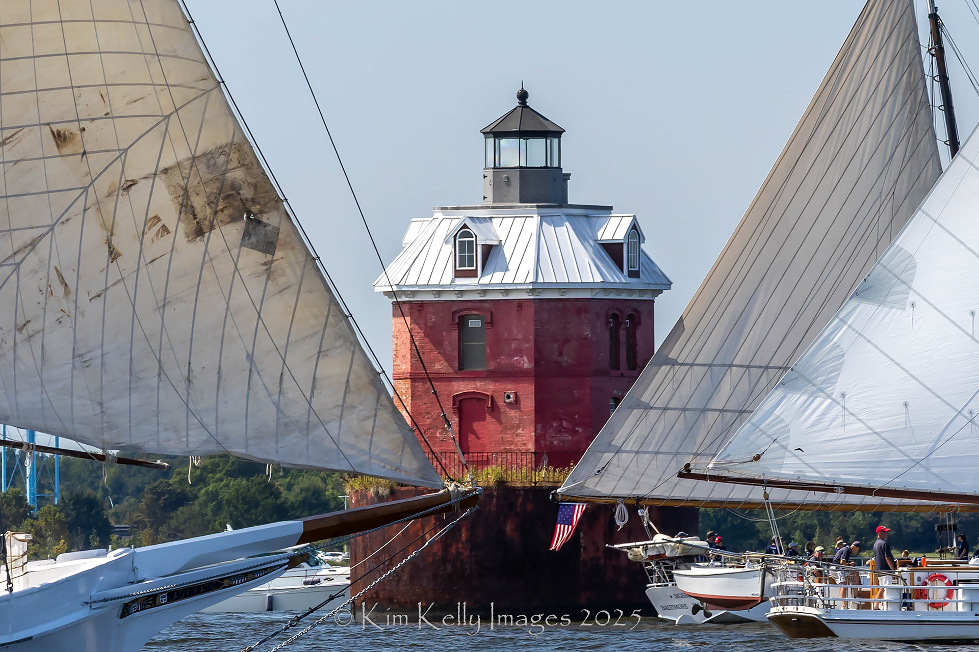 Passing Skipjacks at Sandy Point Shoal Light