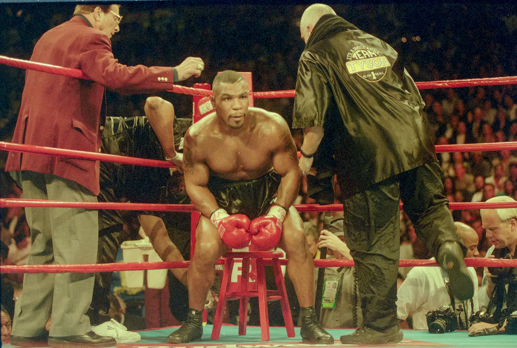 Las Vegas, Nov 9, 1996. MGM Grand Hotel & Casino. Mike Tyson v Evander Holyfield 1. The bell rings for the start of the third round and Tyson stares down his opponent in the opposite corner.