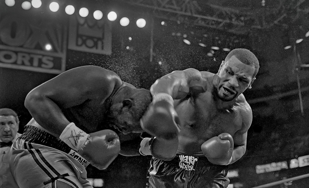 Mike Tyson v Buster Mathis Jr. Dec 16, 1995. Philadelphia, Pa; Mike Tyson lands a right hook to Mathis' head.