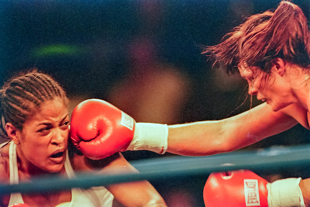 Auburn Hills, Mi; Oct 20, 2000. Leila Ali v Kendra Lenhart. Leila Ali is caught by a right jab from Lenhart. However, Ali won the bout with a unanimous decision. Watching riingside her father Muhammad Ali.