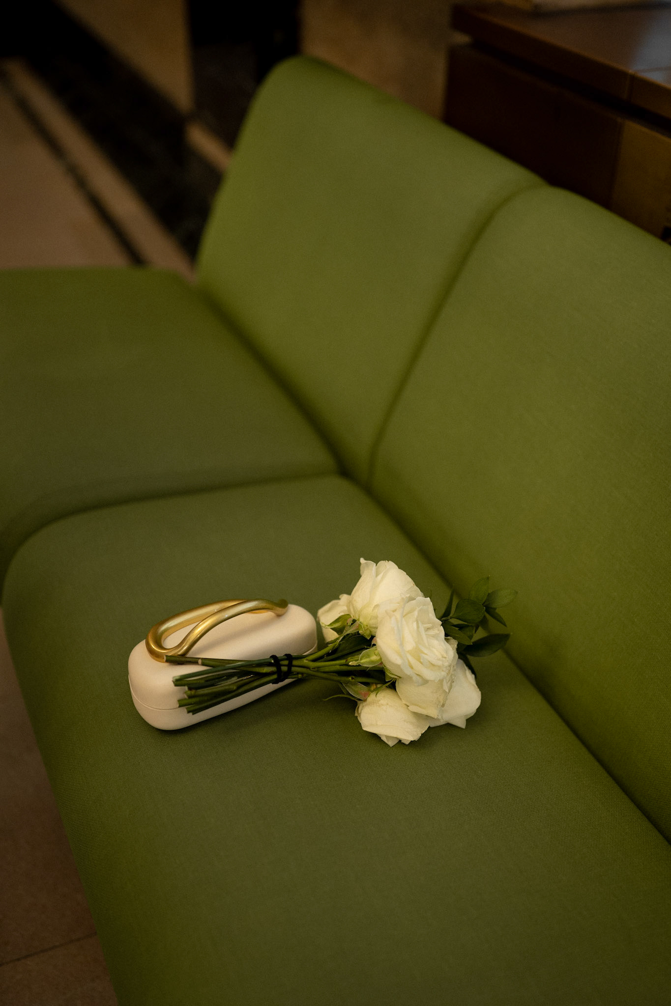 Photograph of bride's bouquet and clutch at New York City Hall by Catherine Claire Art