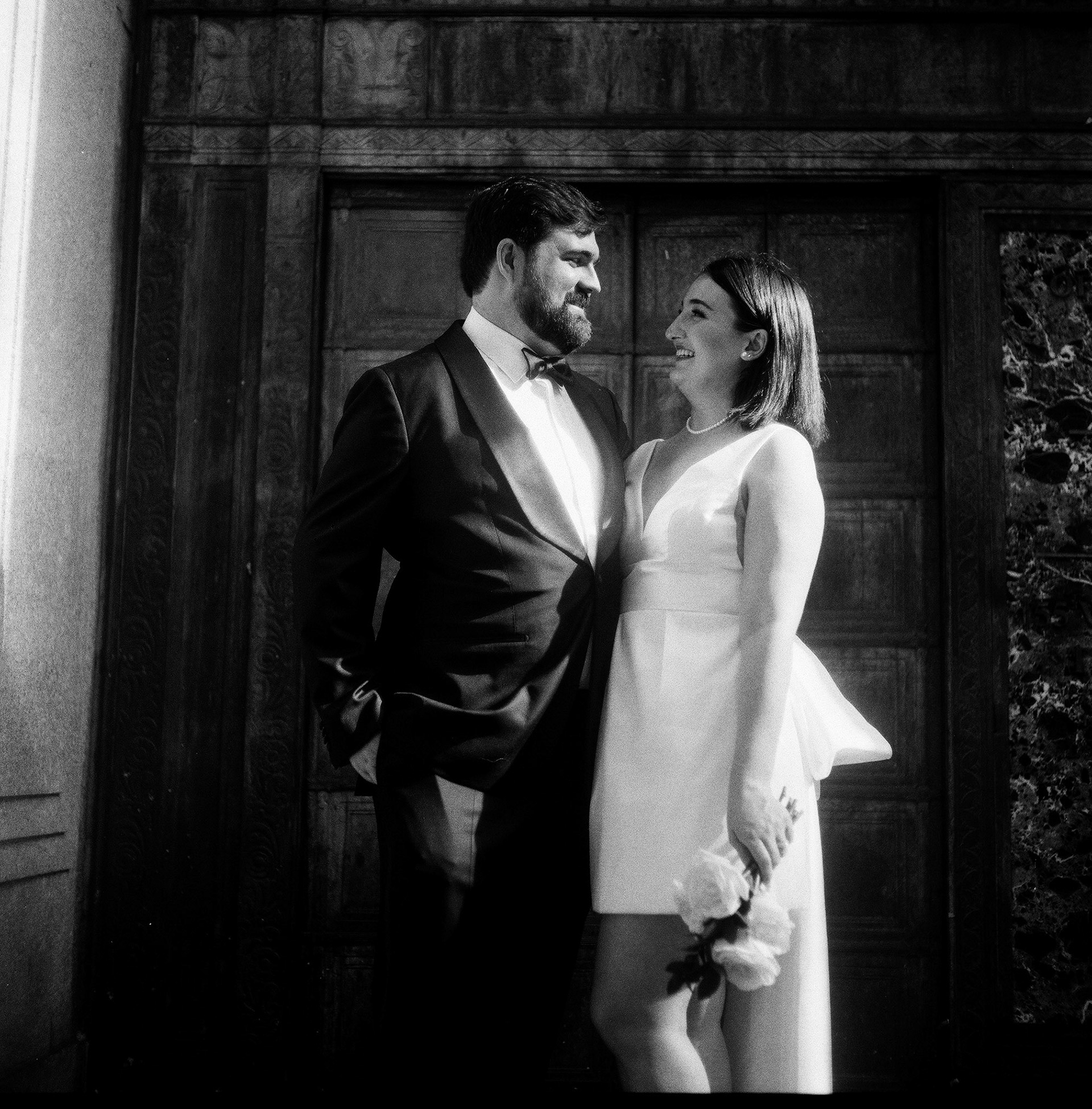 Medium format 120mm film photo of bride & groom outside New York City Hall by Catherine Claire Art. 