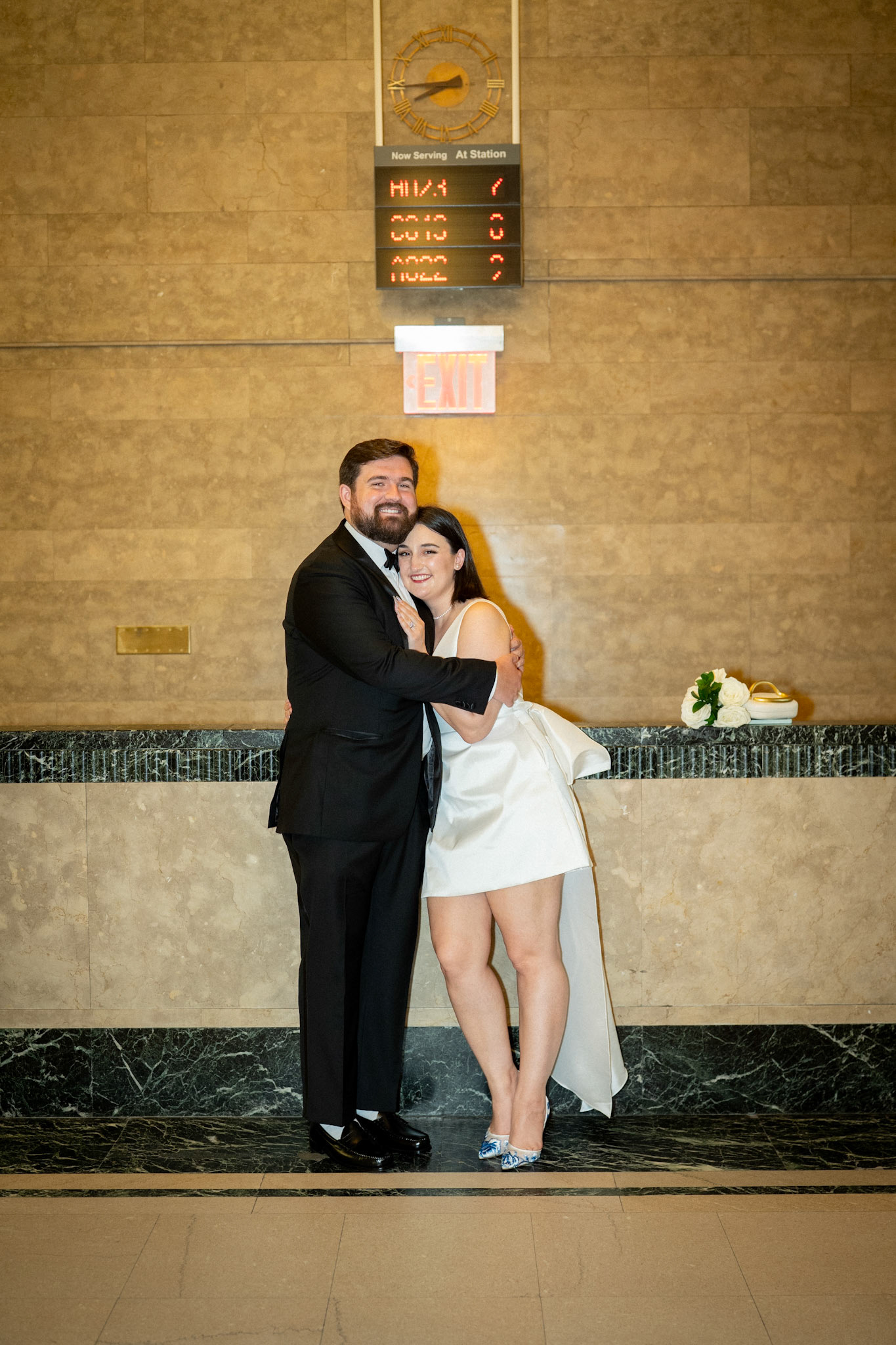 Bride & groom getting married at New York City Hall. Photograph by Catherine Claire Art.