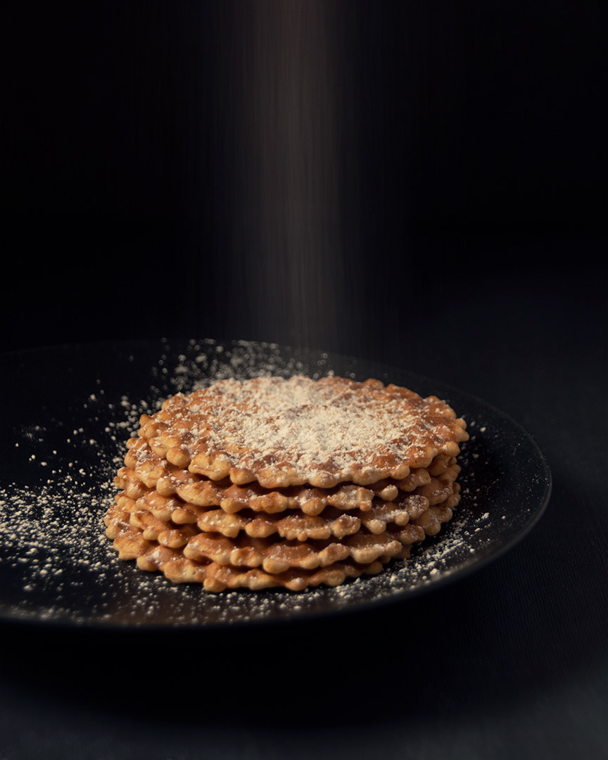 Pizzelles and powdered sugar