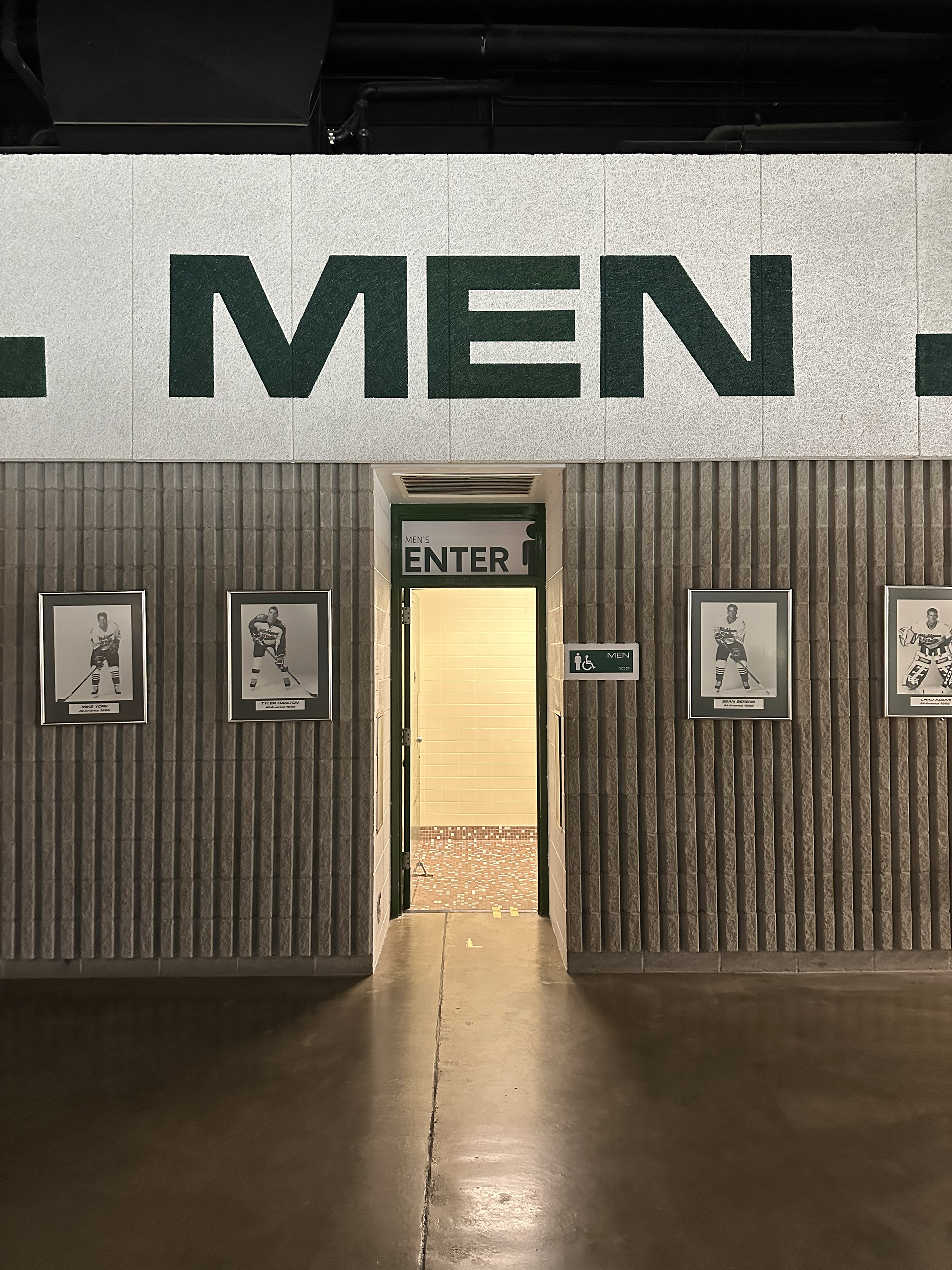 Munn Ice Arena Men's Bathroom Entrance Sign