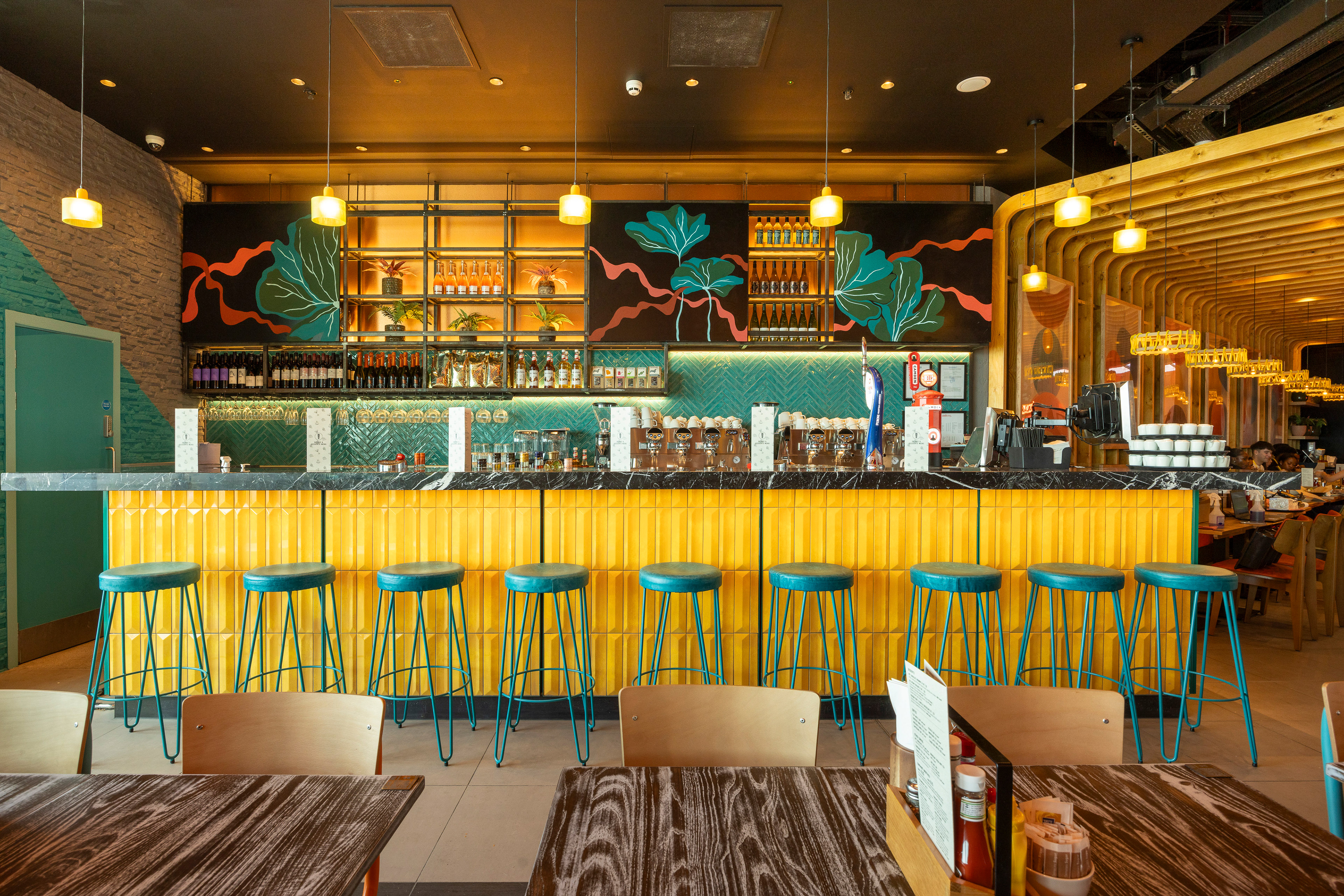 Giraffe, Manchester Airport T2. TRGPLC