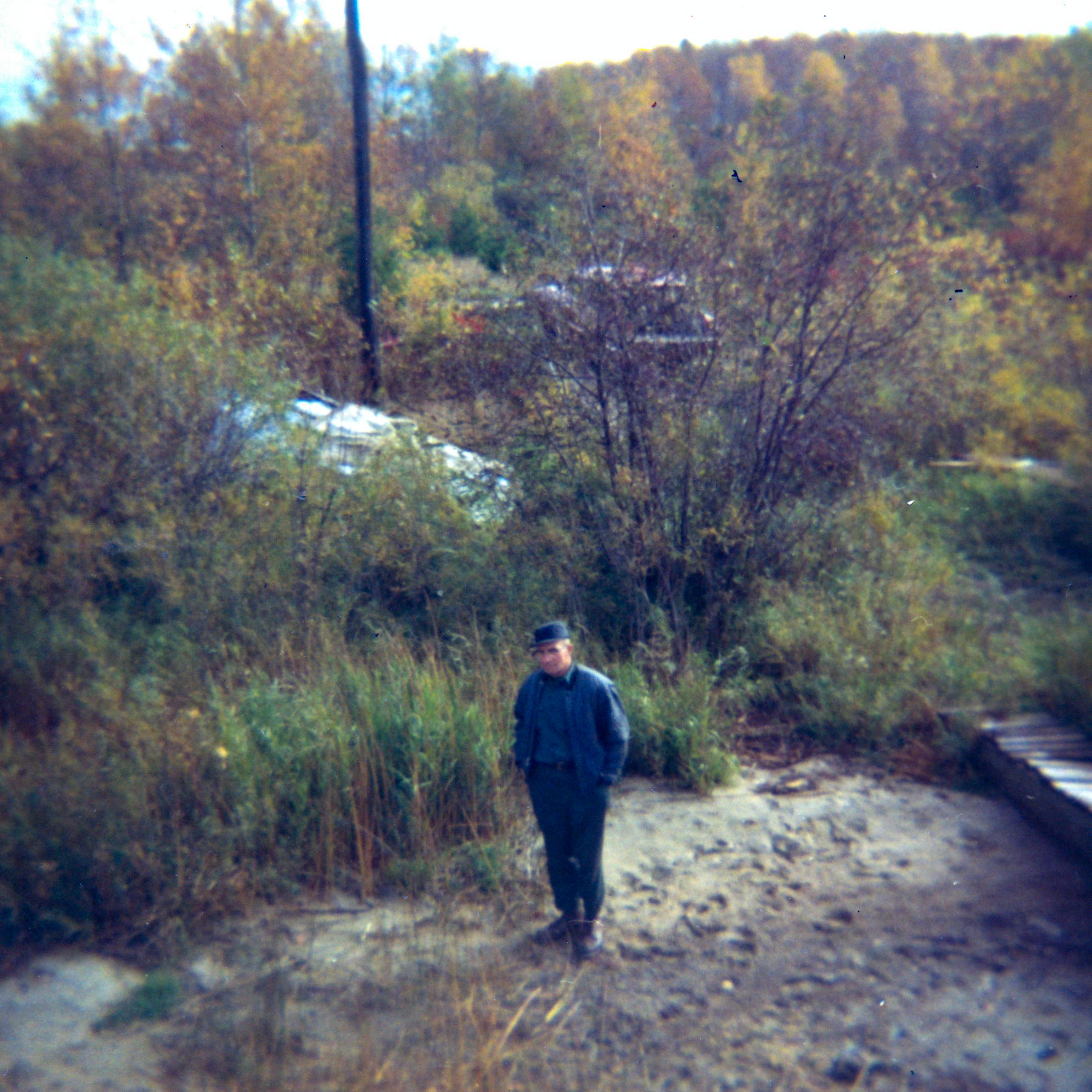 "10-13-70 You can tell who this is. I am sure our red car in the back and notice how low the lake is. Taken from on top of the pontoon boat" [Oct 70]