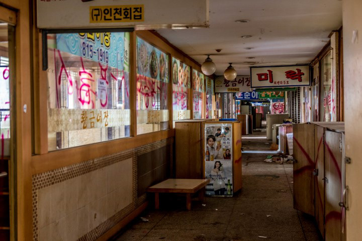Second floor already vacated and marked for demolition
