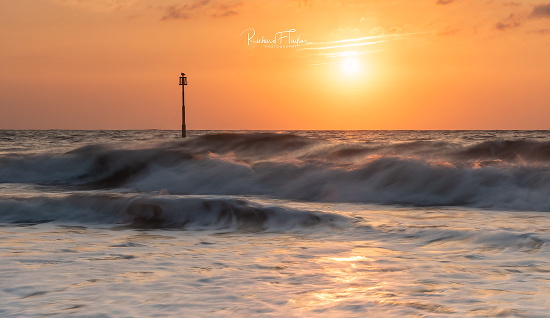 Golden Hour Glory: Basking in the Beauty of Teignmouth Beach at Sunrise