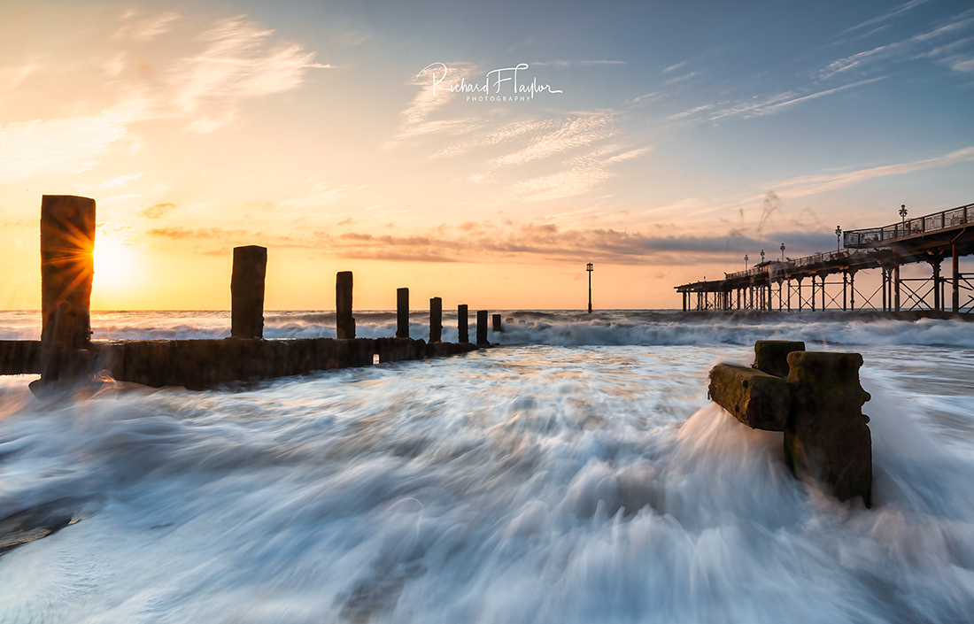 Teignmouth Pier at Sunrise: A Golden Gateway to the New Day
