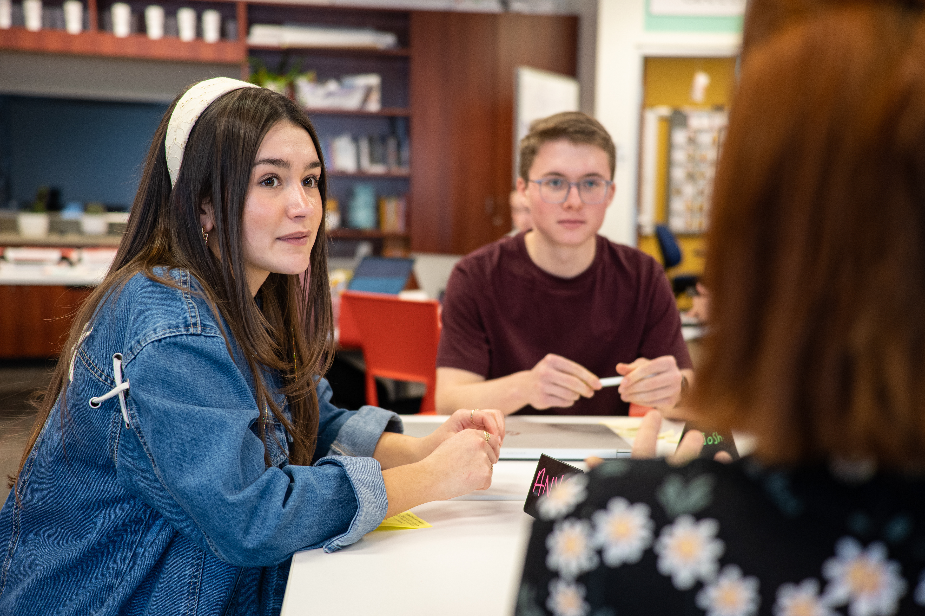 students meet with a client