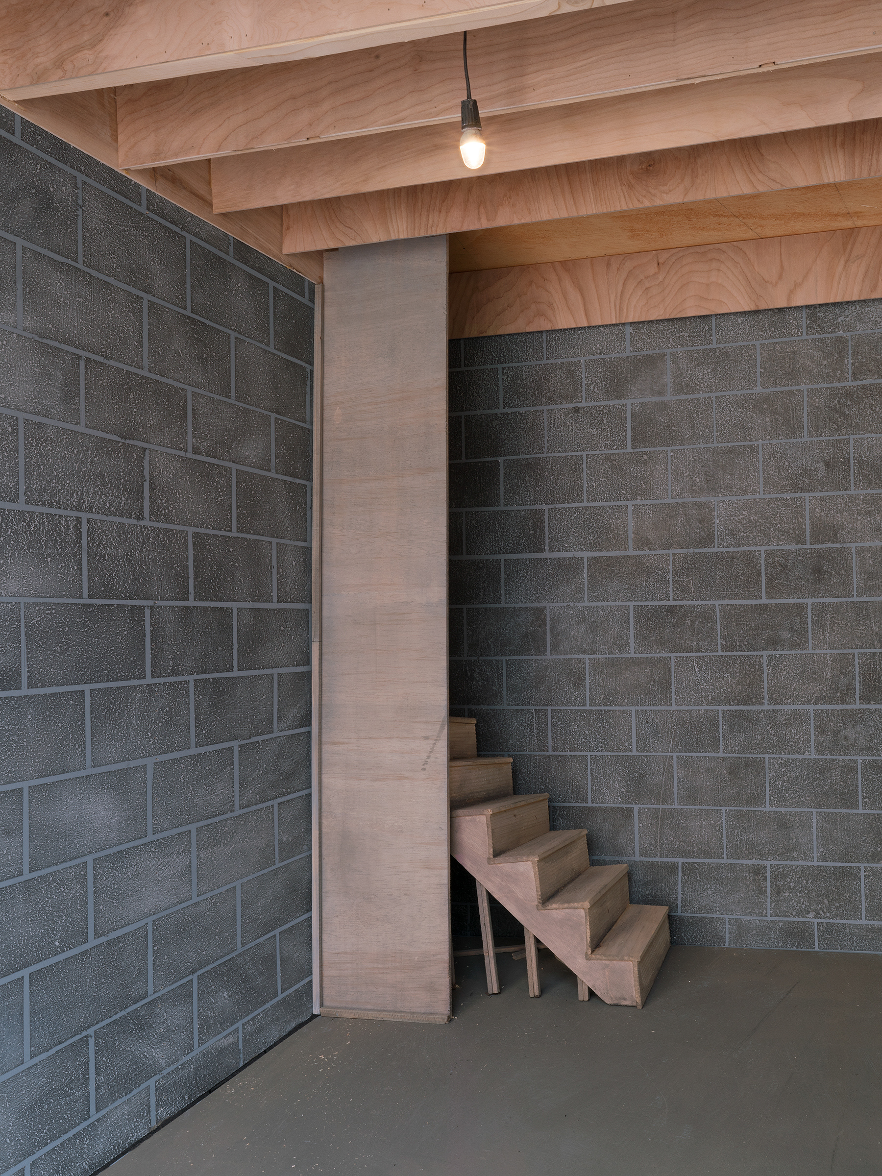 A close detail of "Silver Bullet Test Site" showing a miniature, point-perspective staircase.