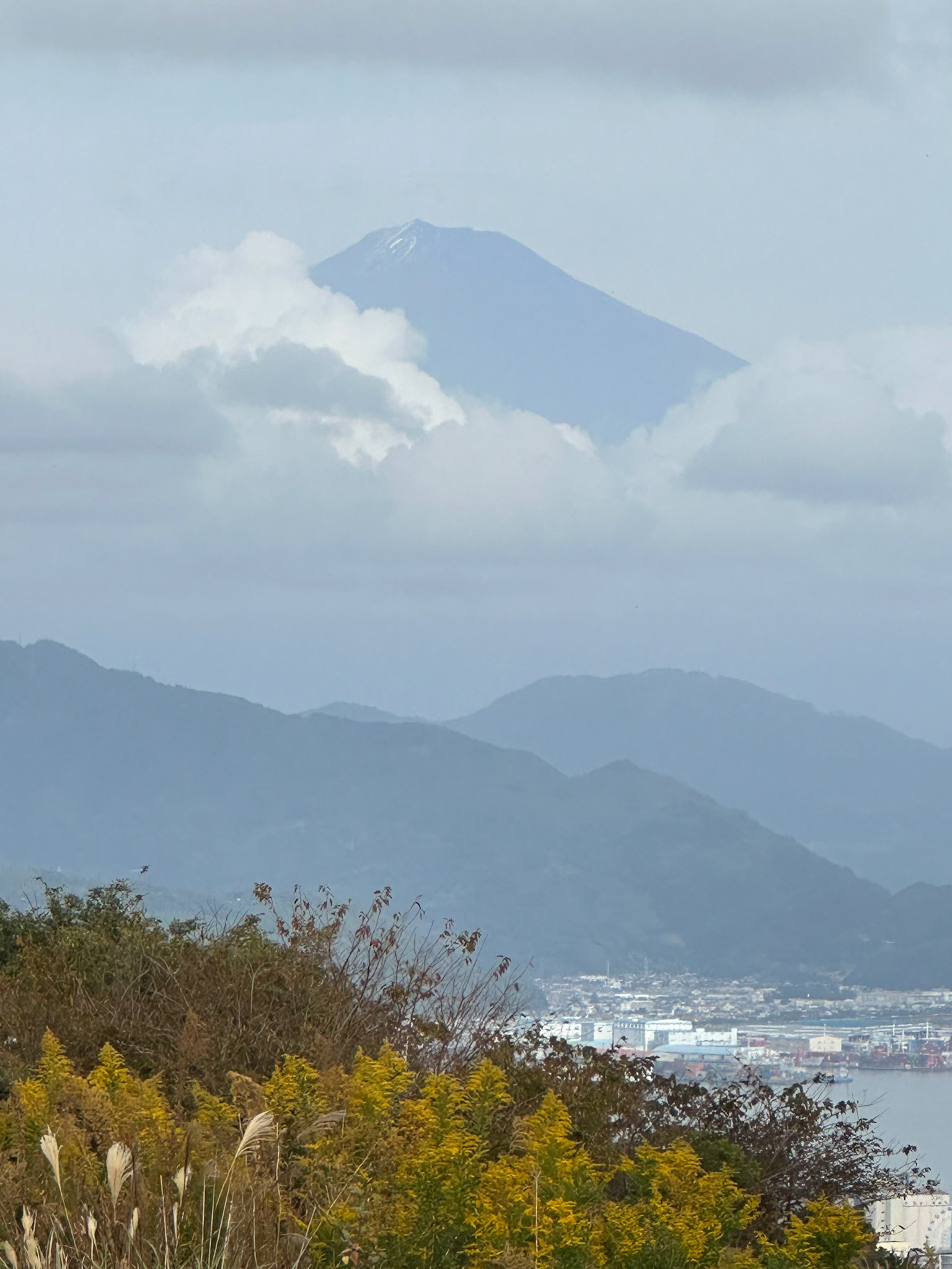Mt. Fuji peaking through the clouds
