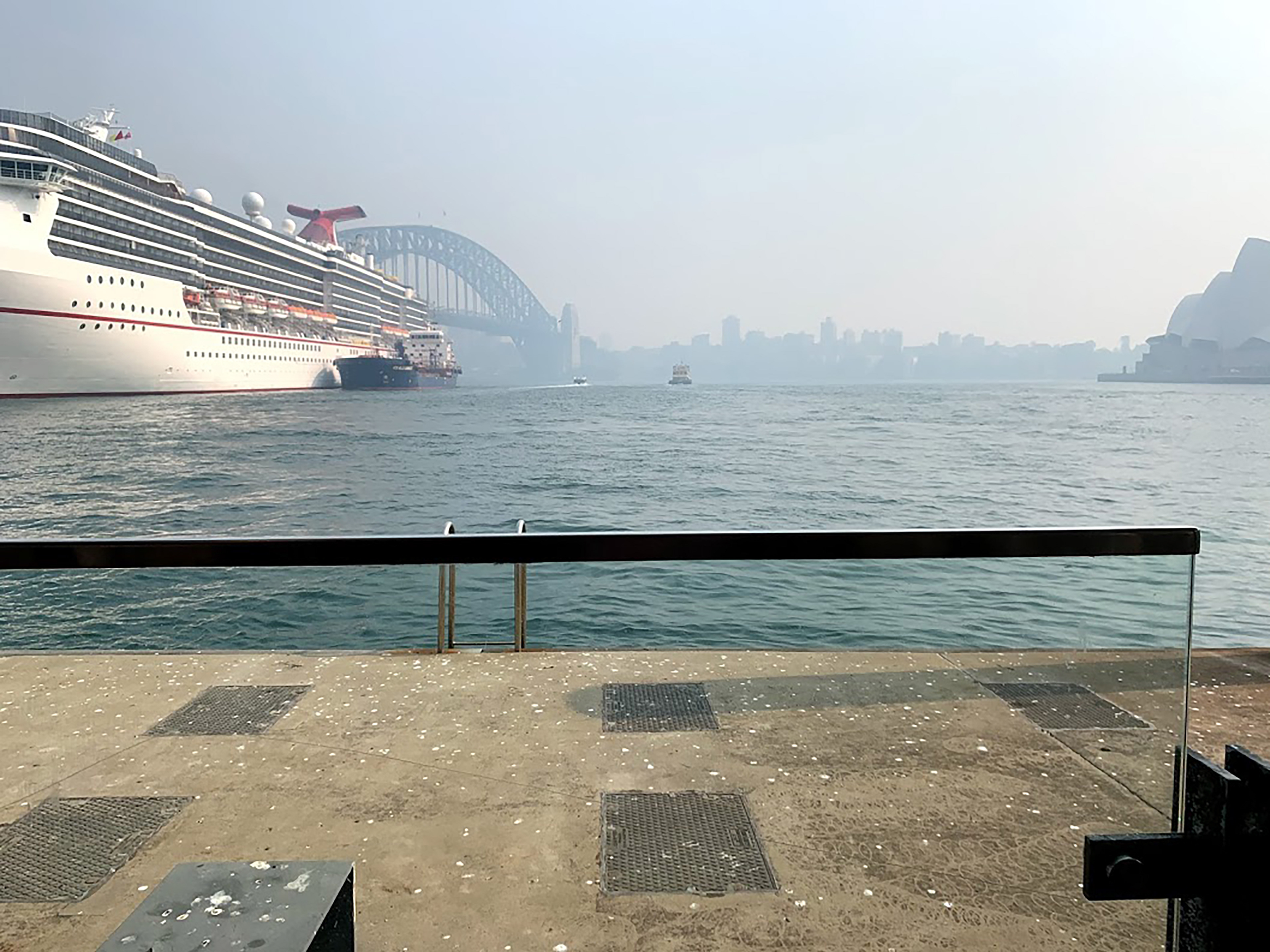 View of Sydney Harbor and Bridge shrouded in smoke from the massive wildfires occurring in Australia at the time of our visit