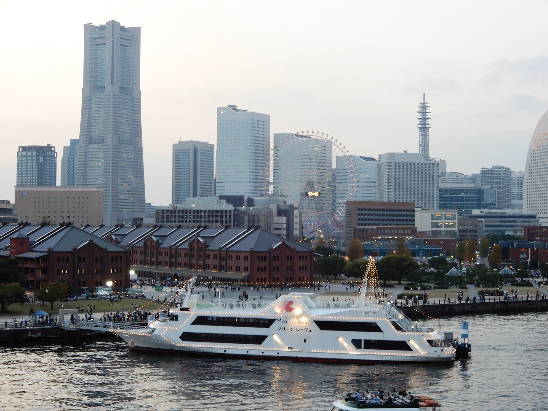 Dinner boat in Yokohama Harbor with Yokohama city in the background