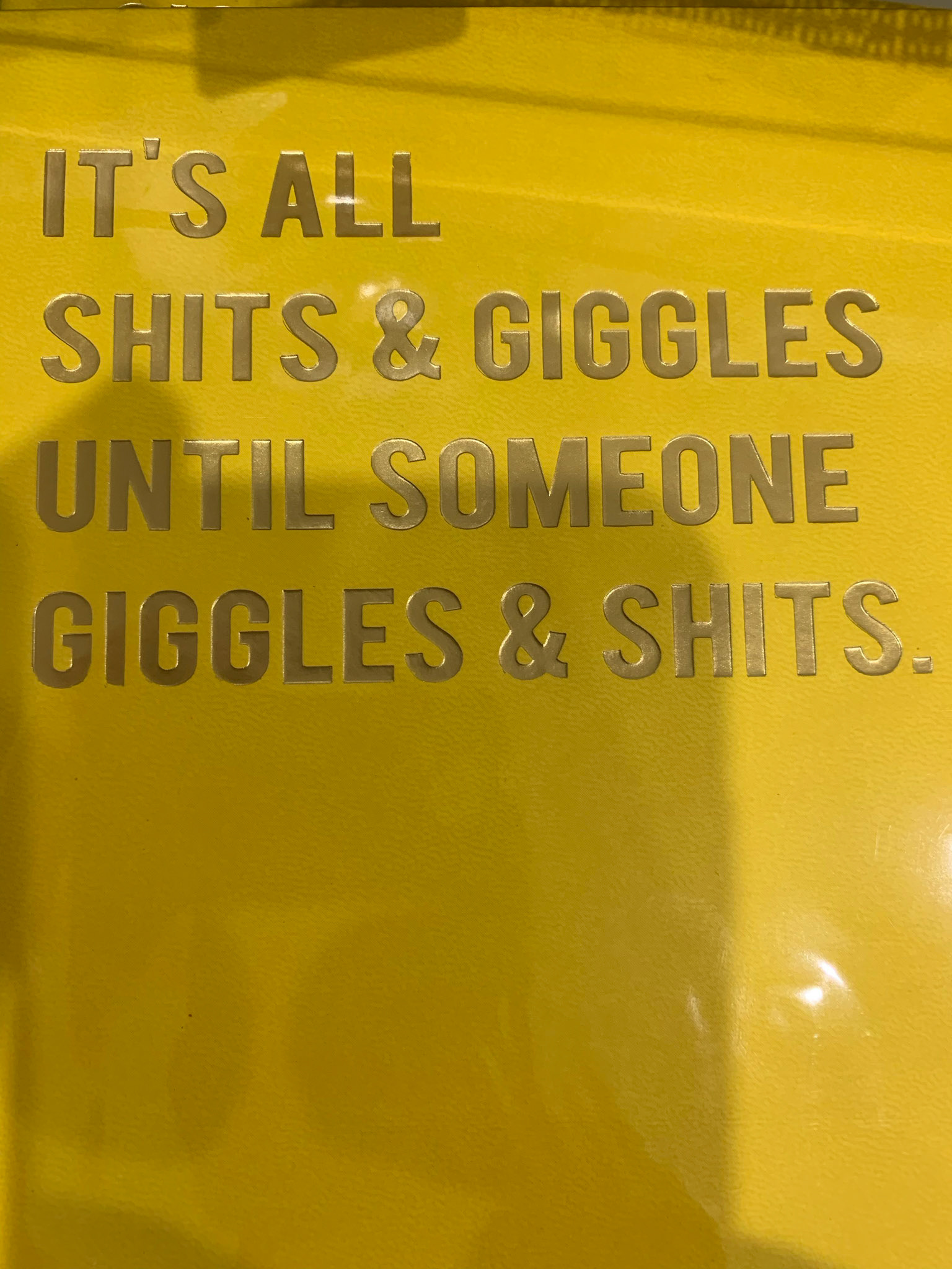 A funny saying on a notebook cover in the Silky Oak gift shop