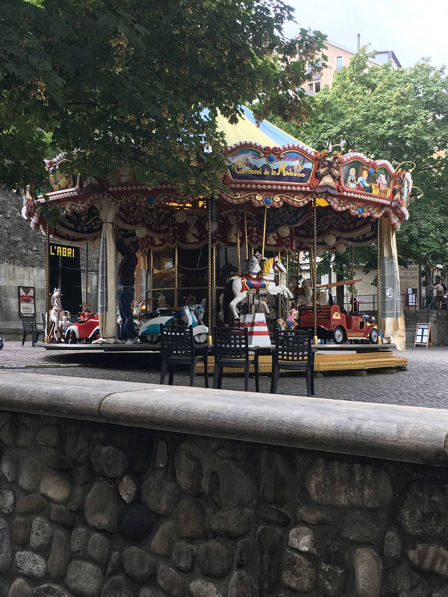 Merry-Go-Round in Place de la Madeleine behind the Temple de la Madeleine