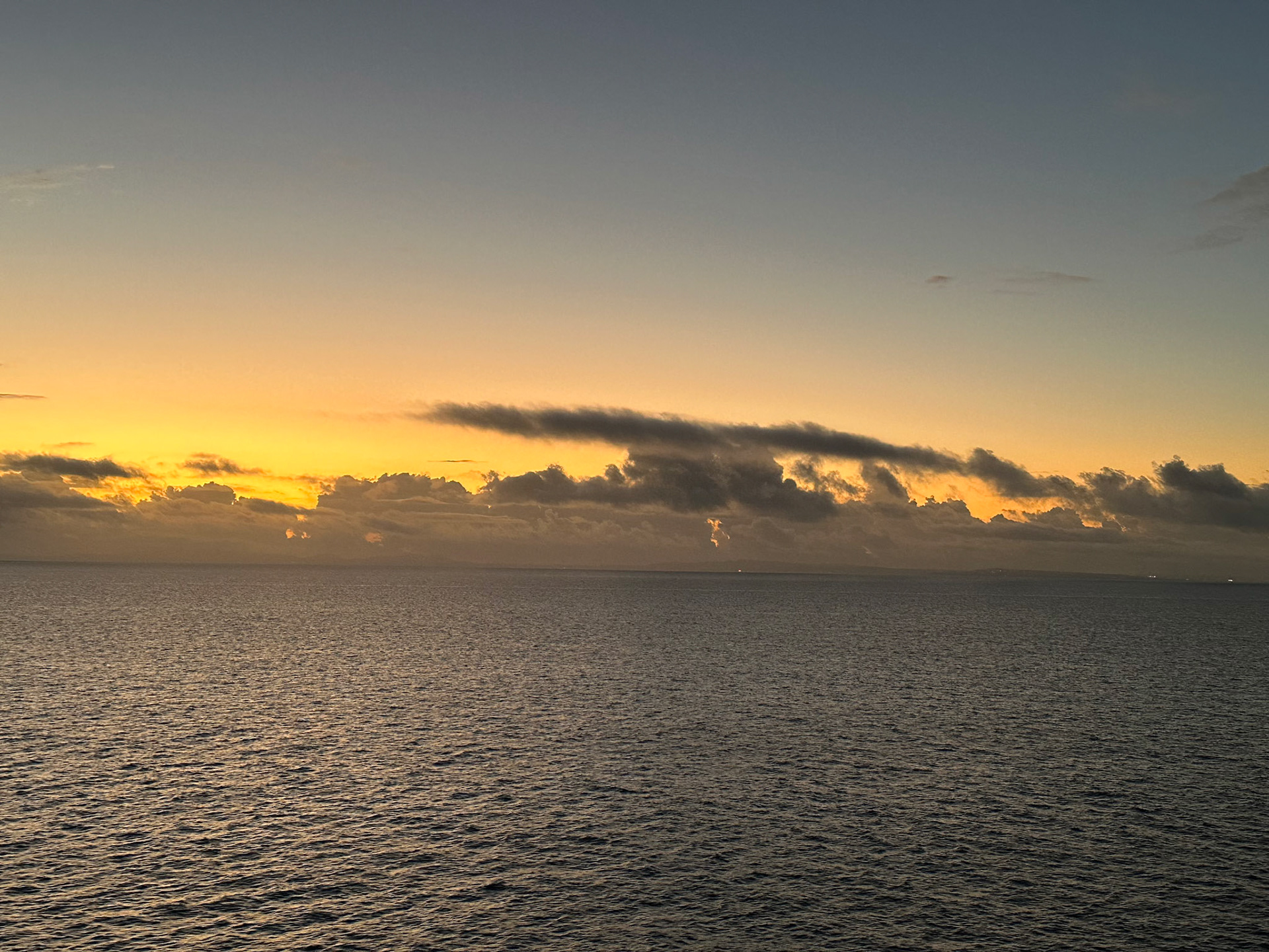 Sunrise as we arrive in Naha on Okinawa from our cruise ship lanai