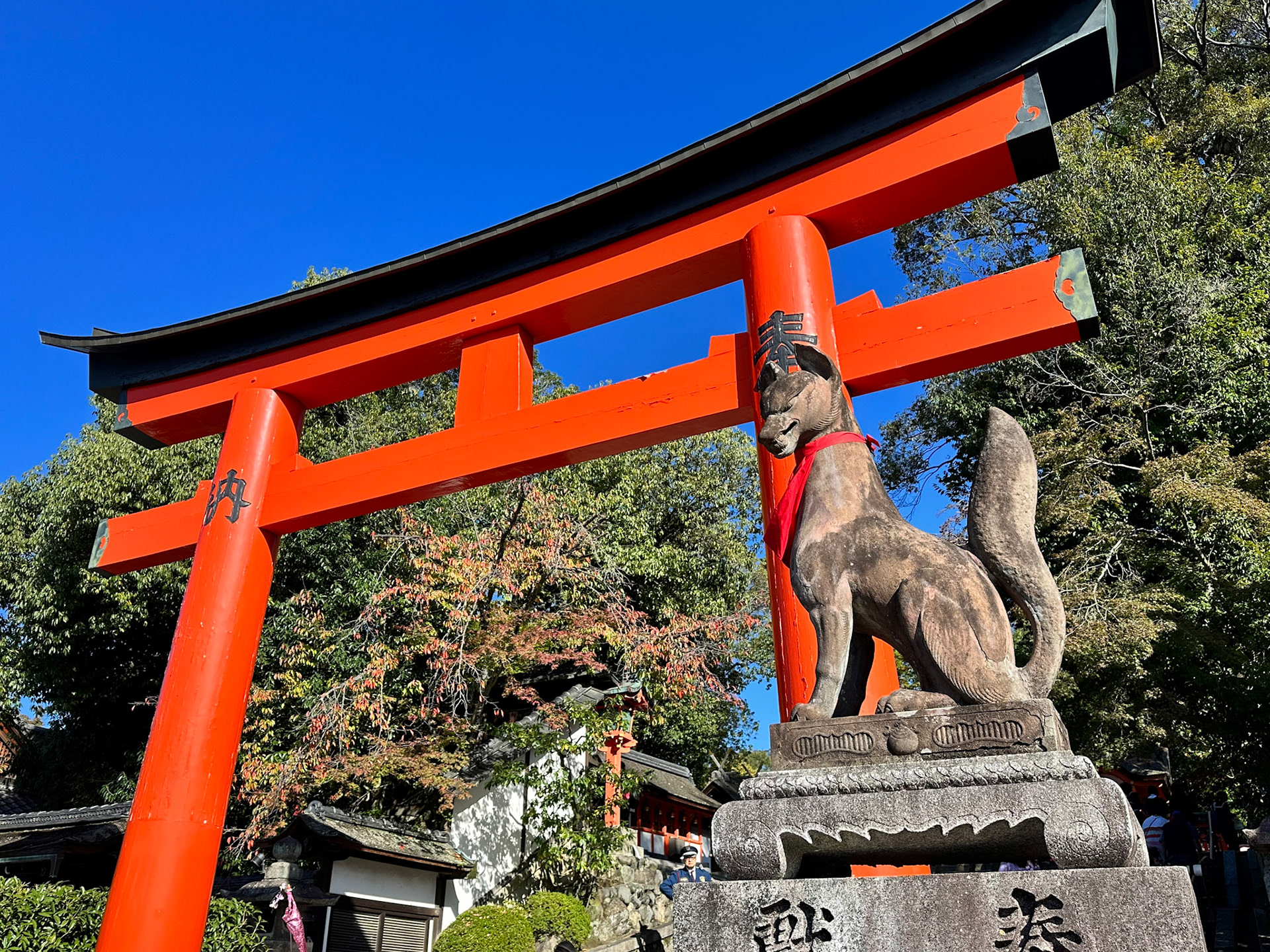 One of the many stone fox statues which are known as Inari foxes or kitsune.