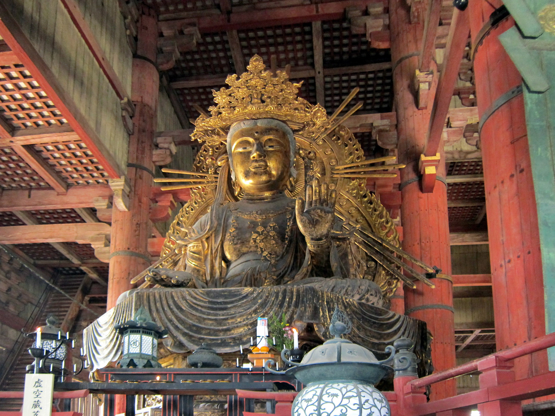 A Bodhisattva, a servant of the main Buddha. There is one of these statues on either side of the Daibutsu.