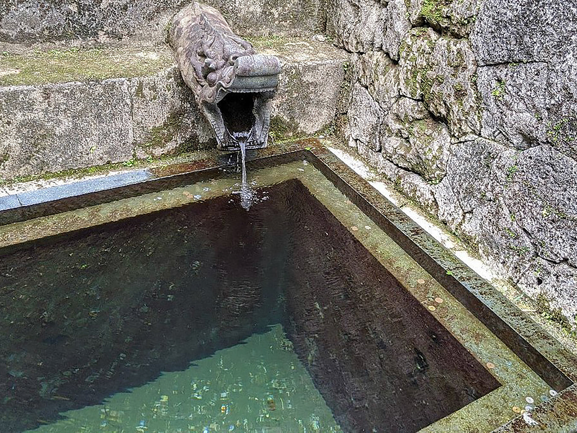 The Ryuhi, a dragon-shaped fountainhead from which spring water flows