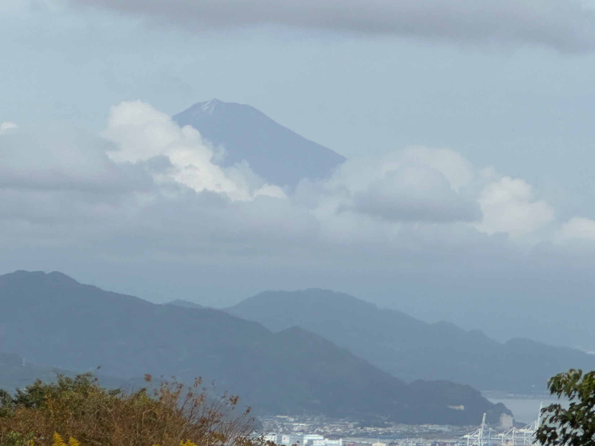 Mt. Fuji peaking through the clouds