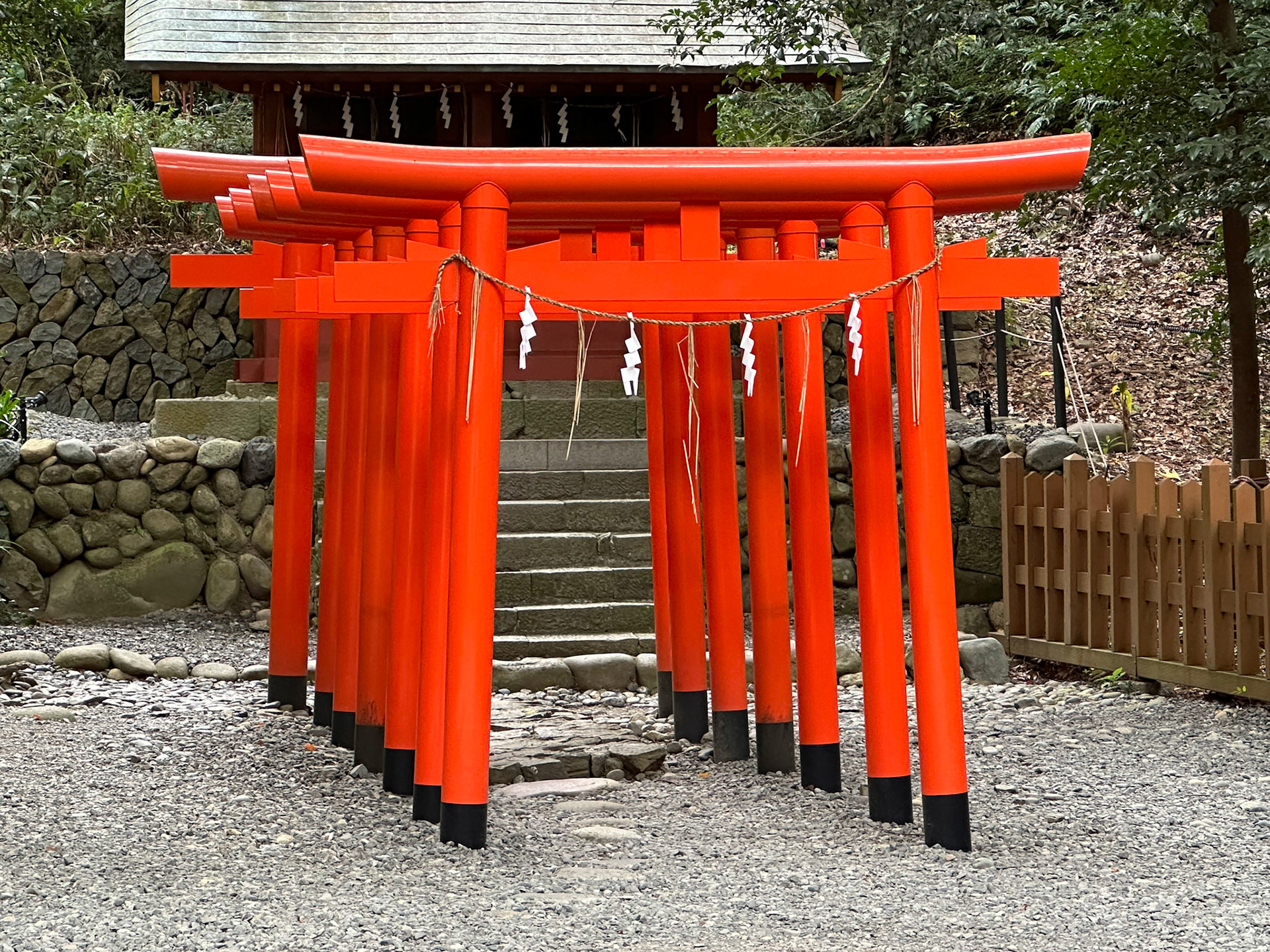 Torii at Kunozan Toshogu Shrine - A torii is a traditional Japanese gate most commonly found at the entrance of or within a Shinto shrine, where it symbolically marks the transition from the mundane to the sacred.
