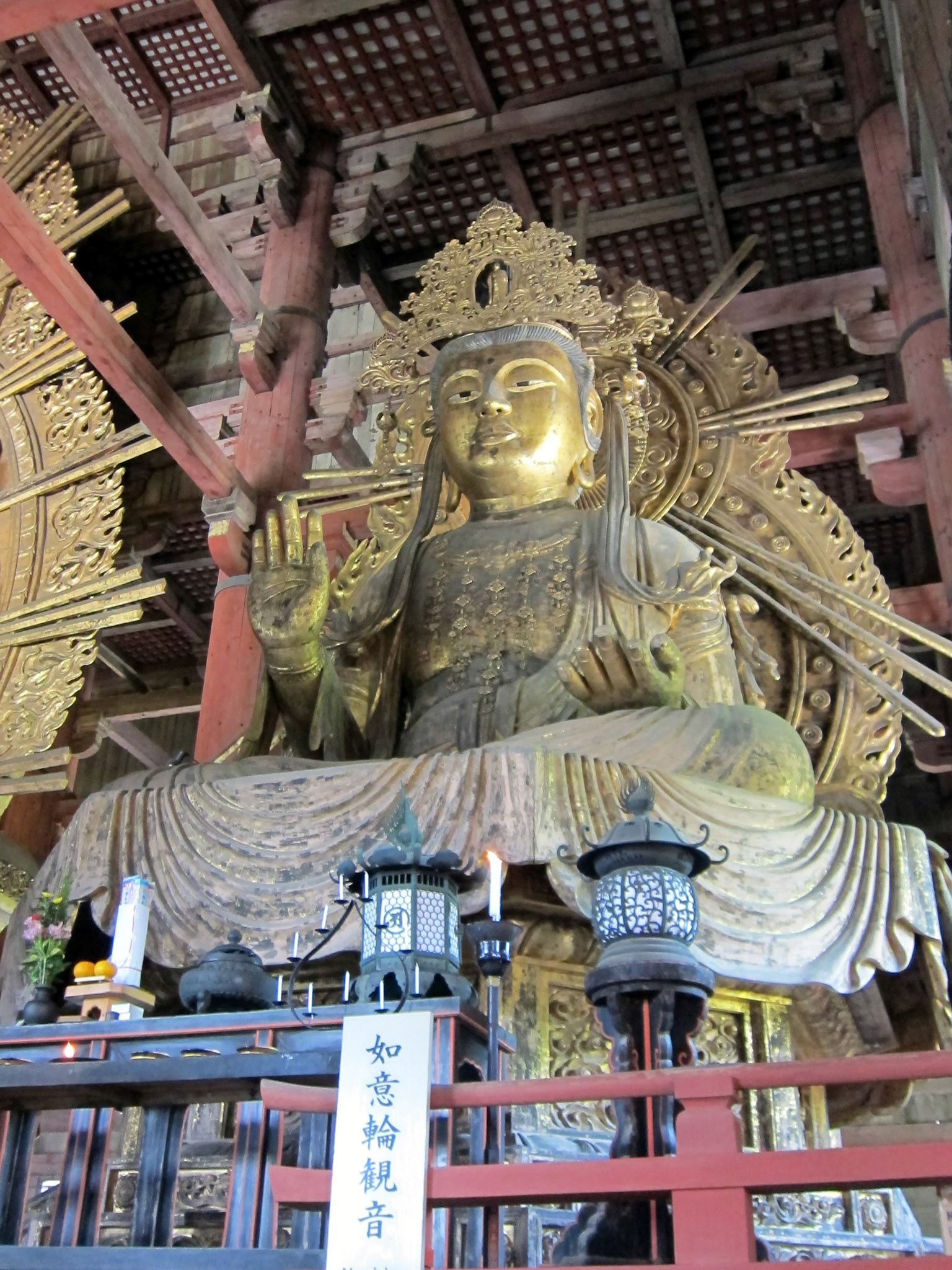 A Bodhisattva, a servant of the main Buddha. There is one of these statues on either side of the Daibutsu.