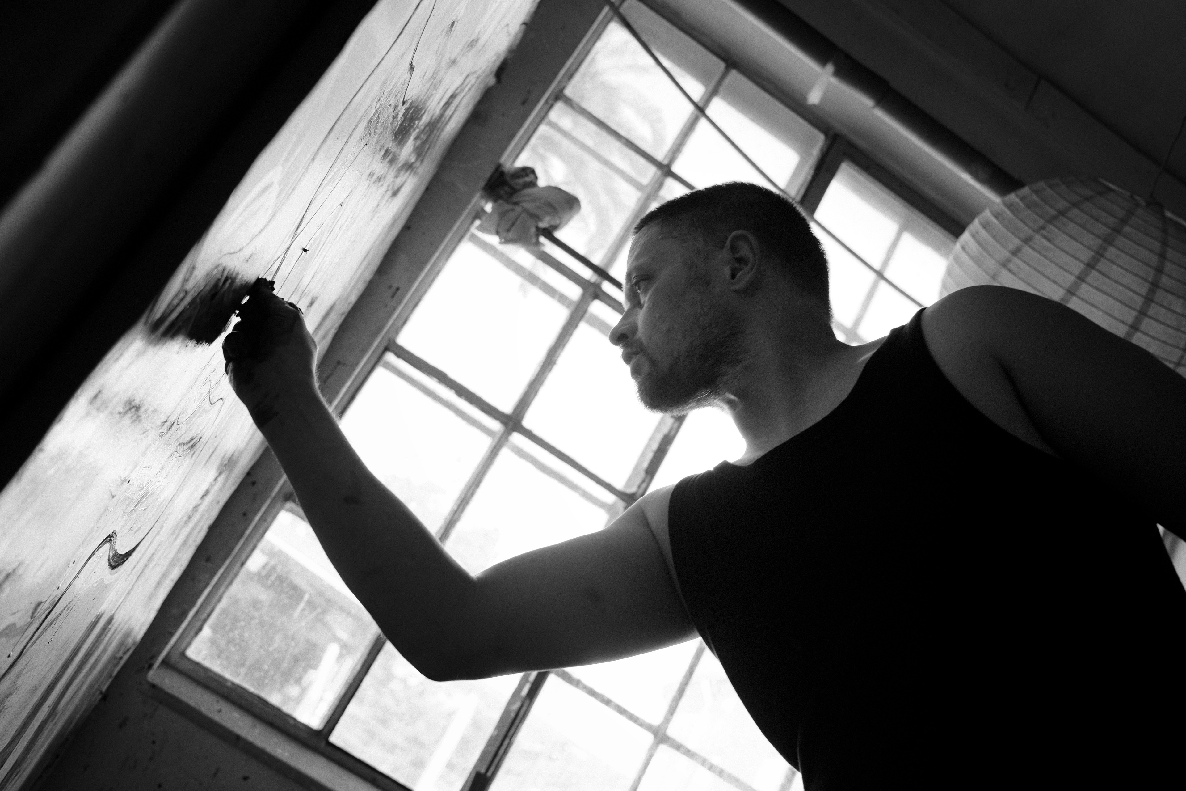 Christiania artist Steven working on his painting. Copenhagen, Denmark 2024.
