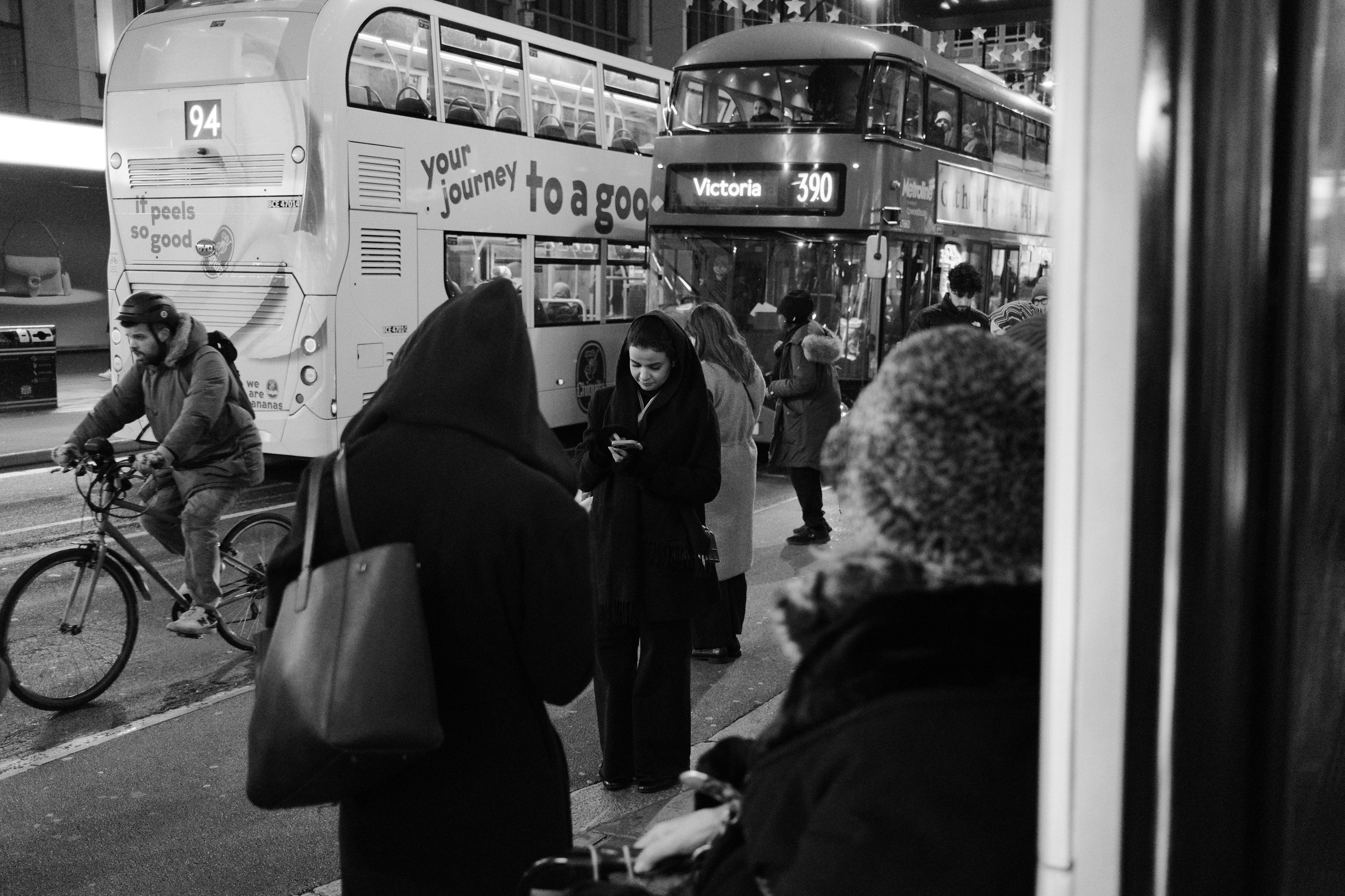 Two women with similar clothes. London, England 2024.