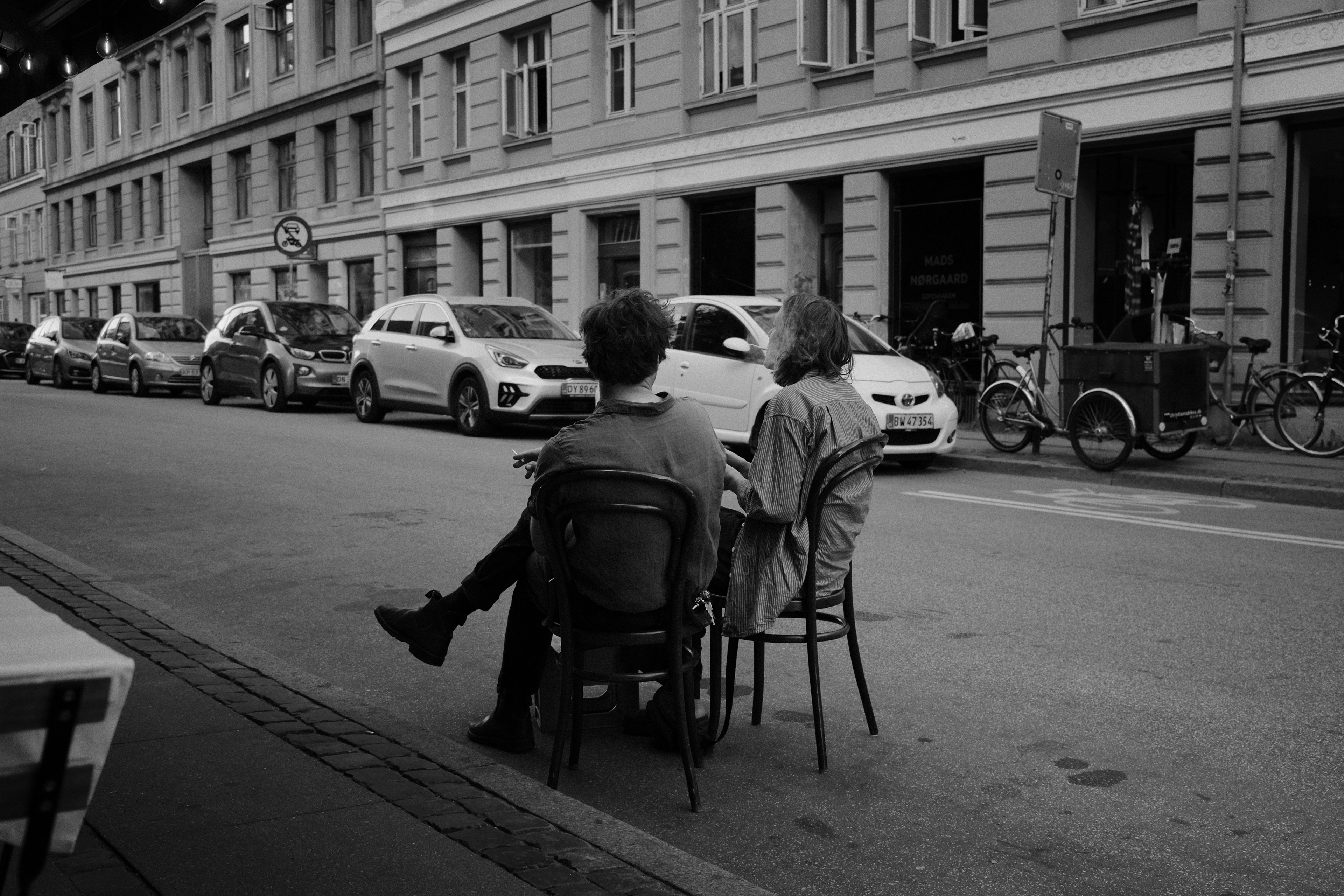 Chairs in the street. Copenhagen, Denmark 2024.