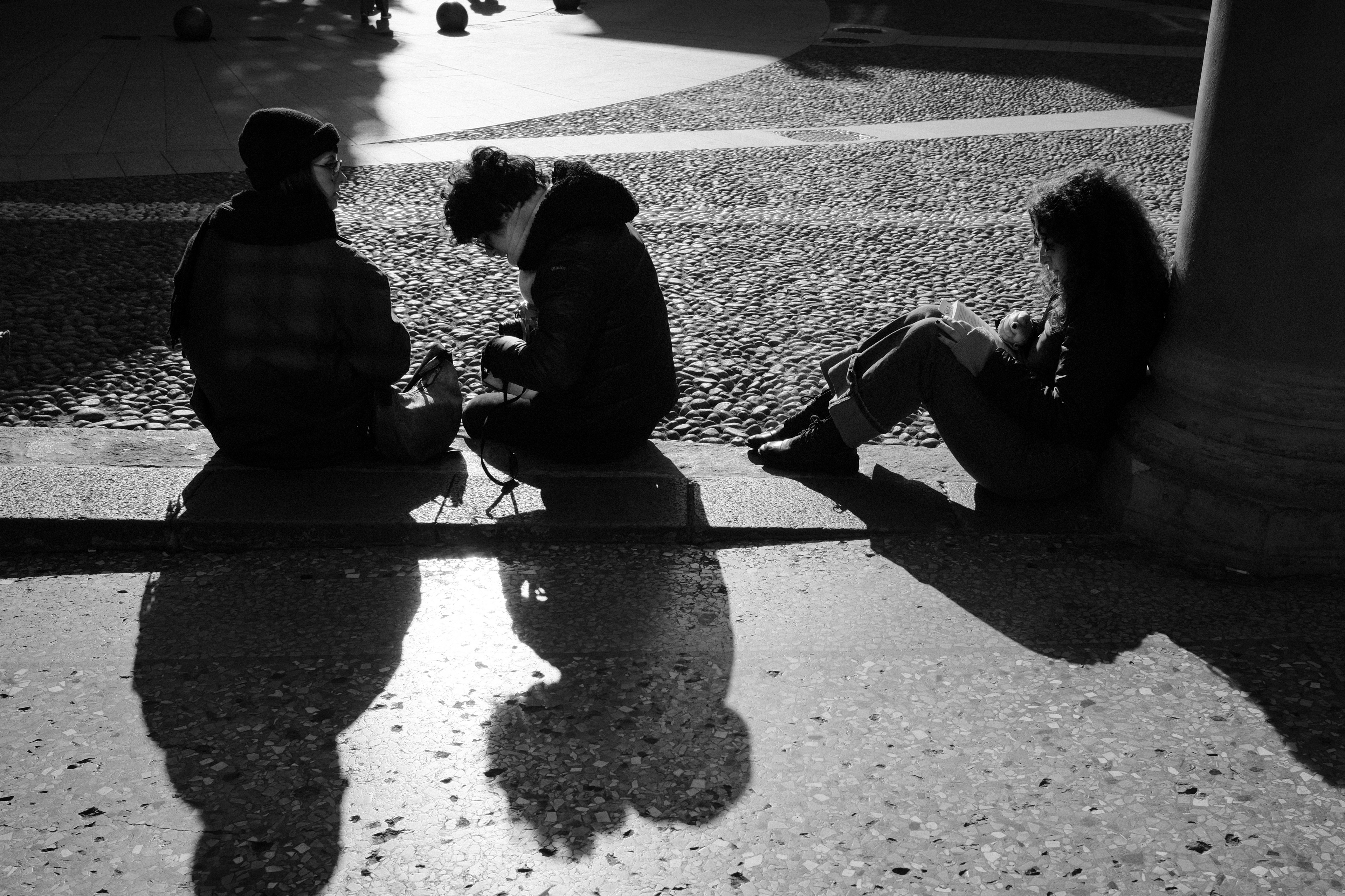 Winter sun in Piazza Santo Stefano. Bologna, Italy 2025.