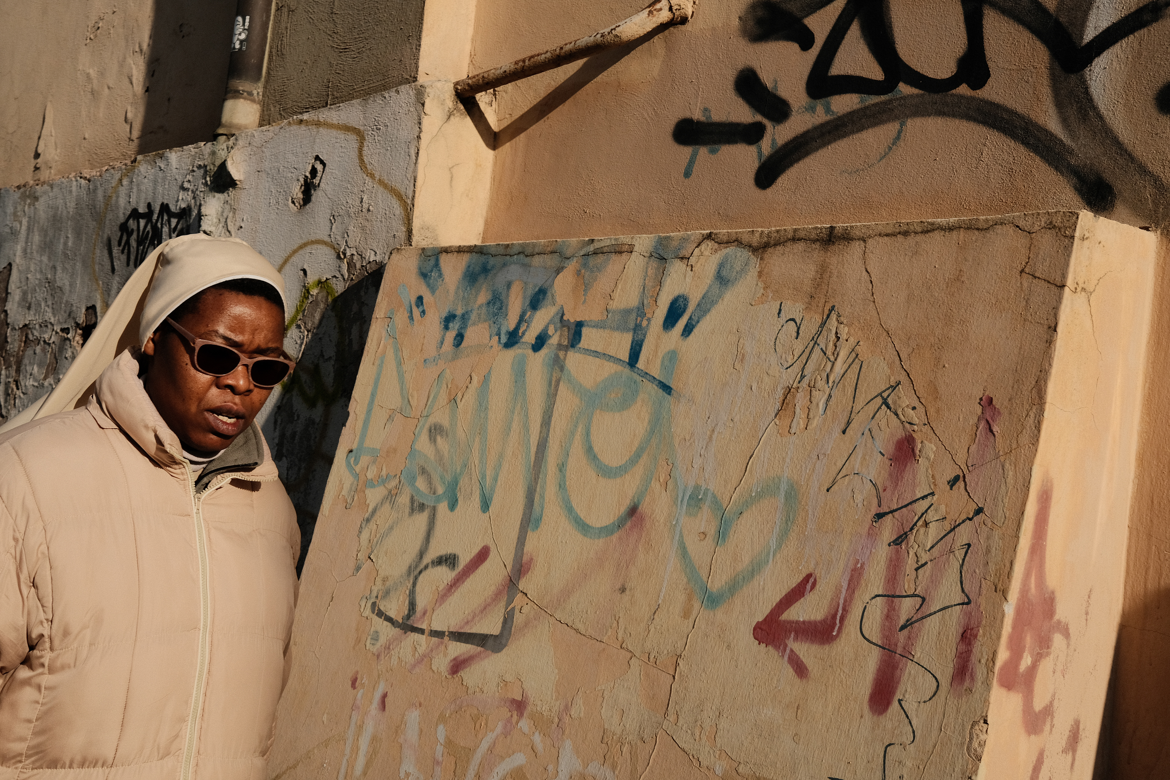 A nun passing by. Rome, Italy 2024.