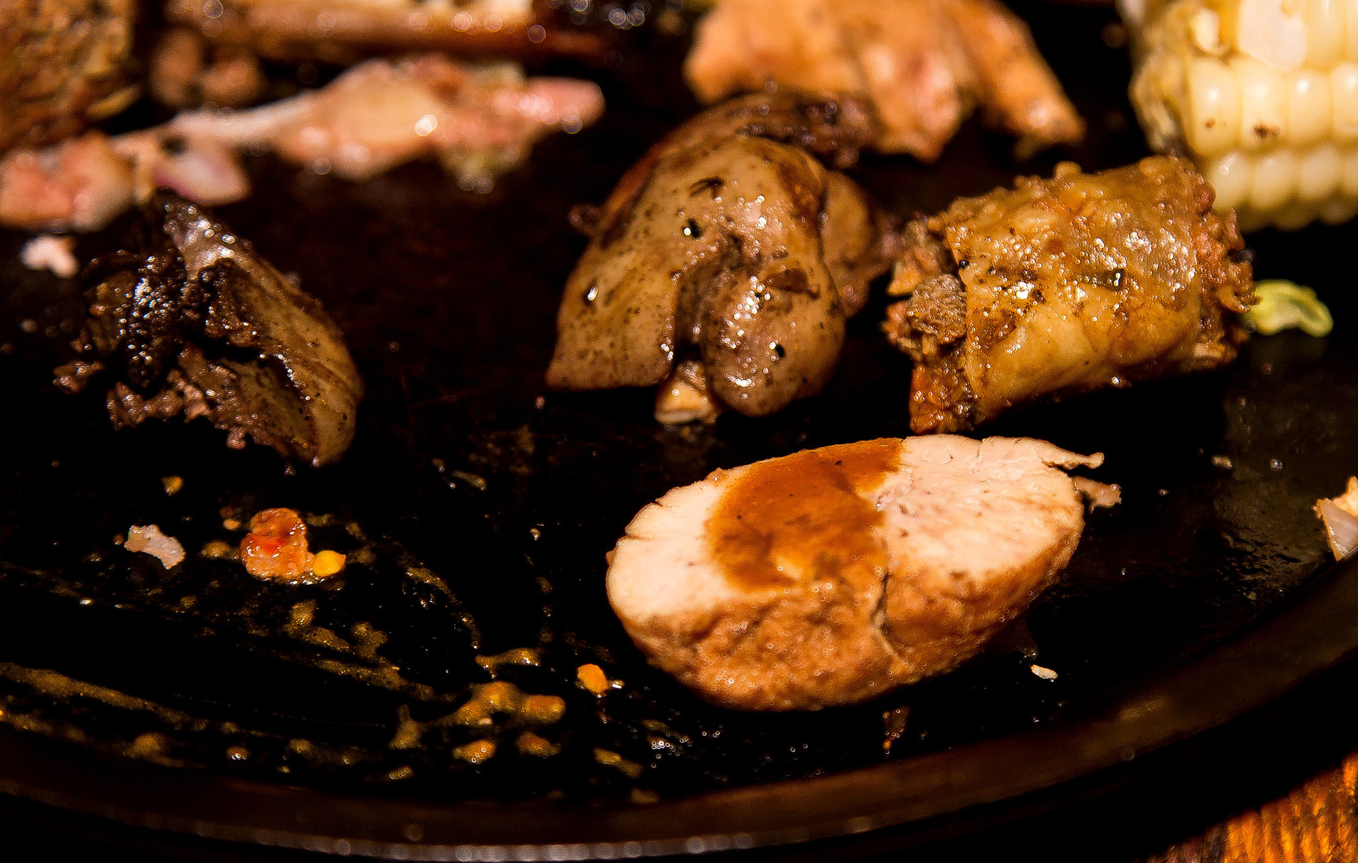 Chicken livers, spicy lamb sausage, and bulls' testicles