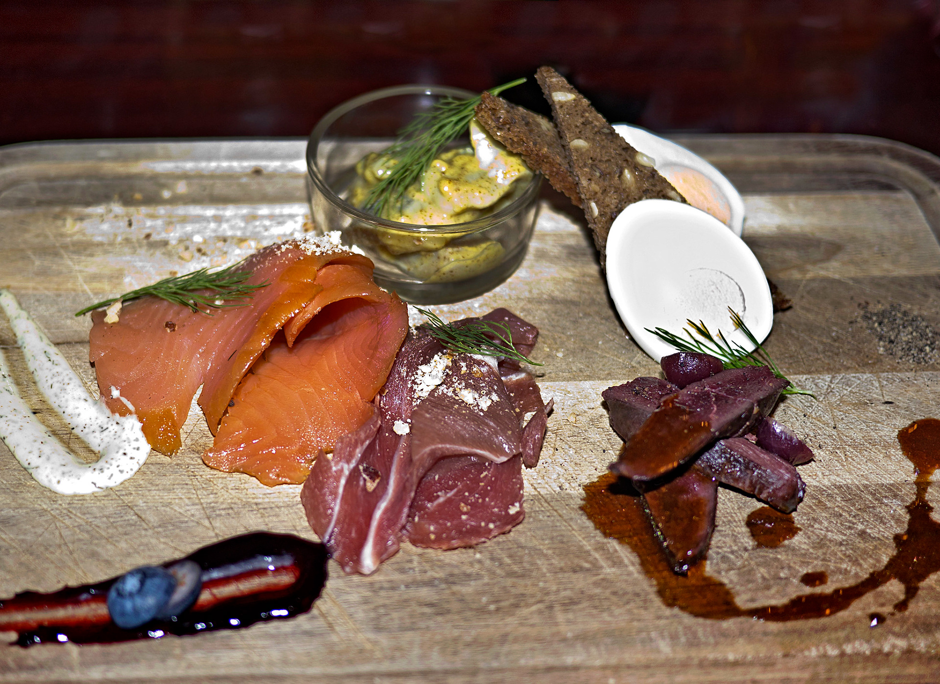 Mustard herring, boiled egg, smoked salmon, lamb carpaccio, smoked puffin