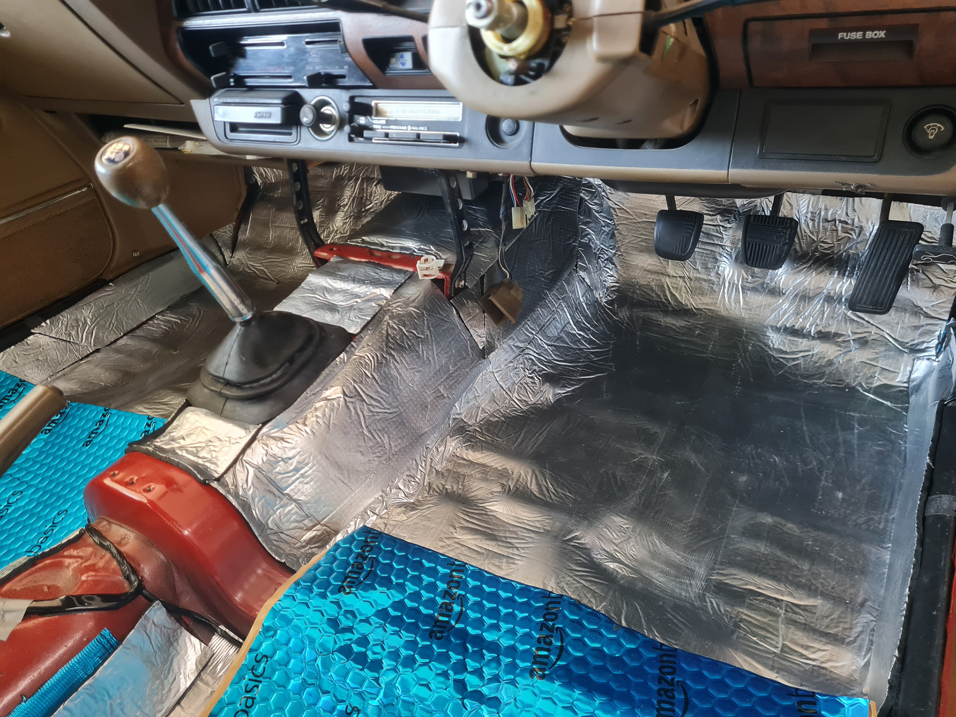 Heat/sound dampening & cushion for comfort