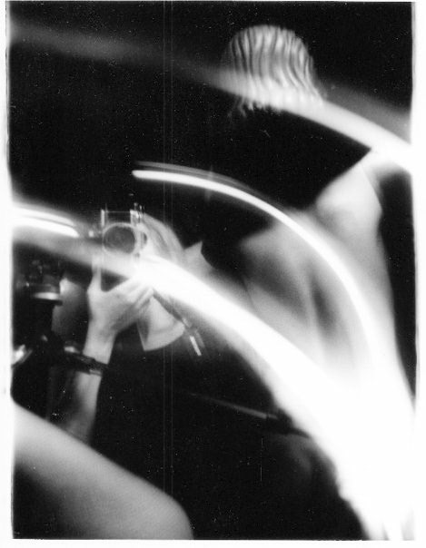 Ad hoc stdio in a veritable studio apartment. Candle light. Bulb setting. Mirror and mannequin.