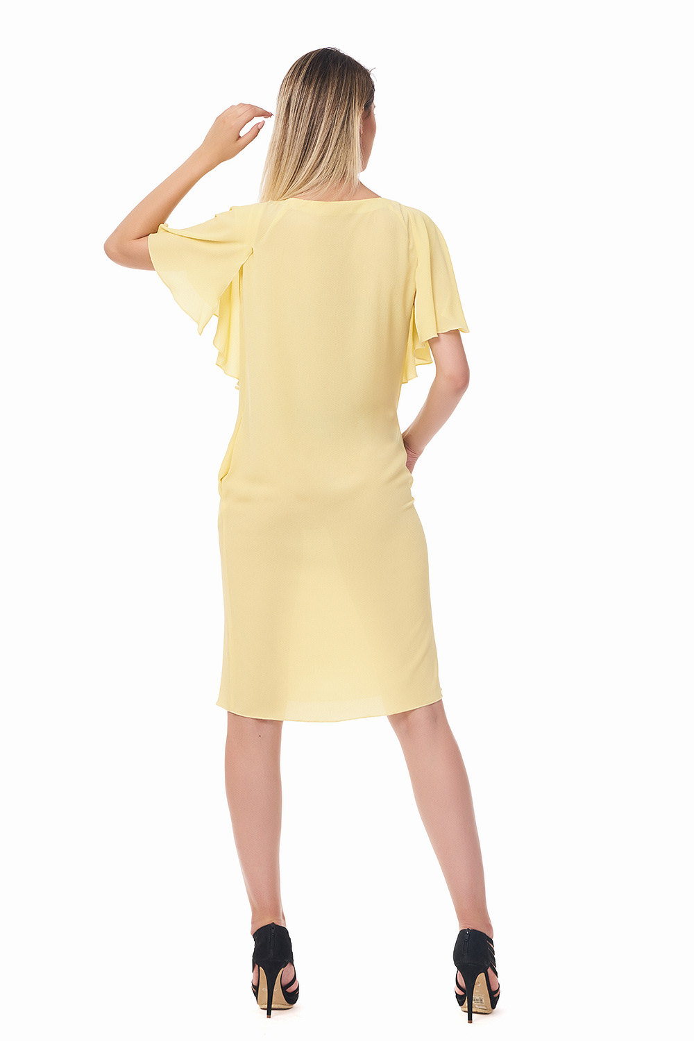 spate rochie galbena fotografiata pe alb