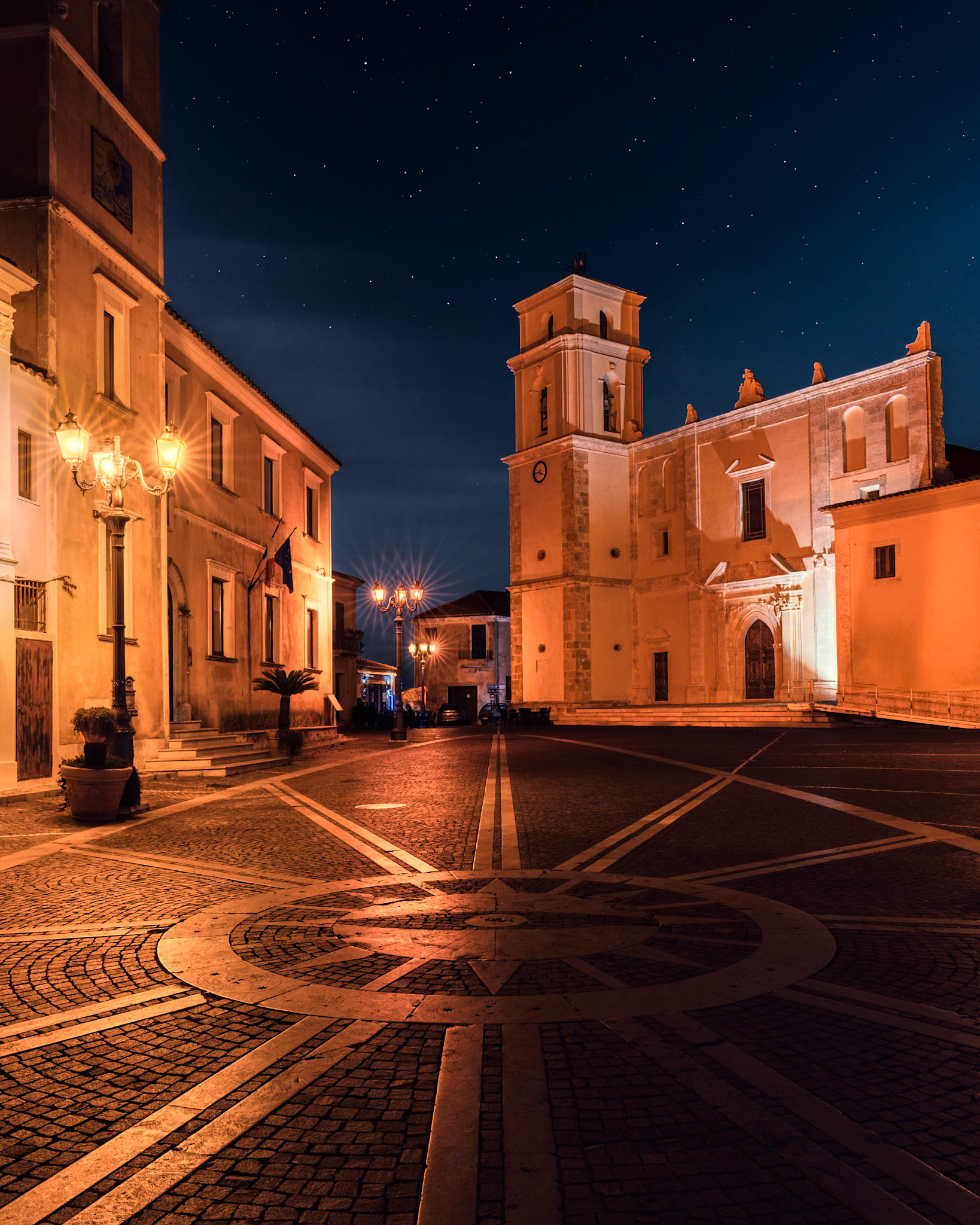 A compass of inlaid stones in the central piazza of the medieval village of Santa Severina, Calabria, points in all directions, providing infinite possibilities for wayfarers of old.