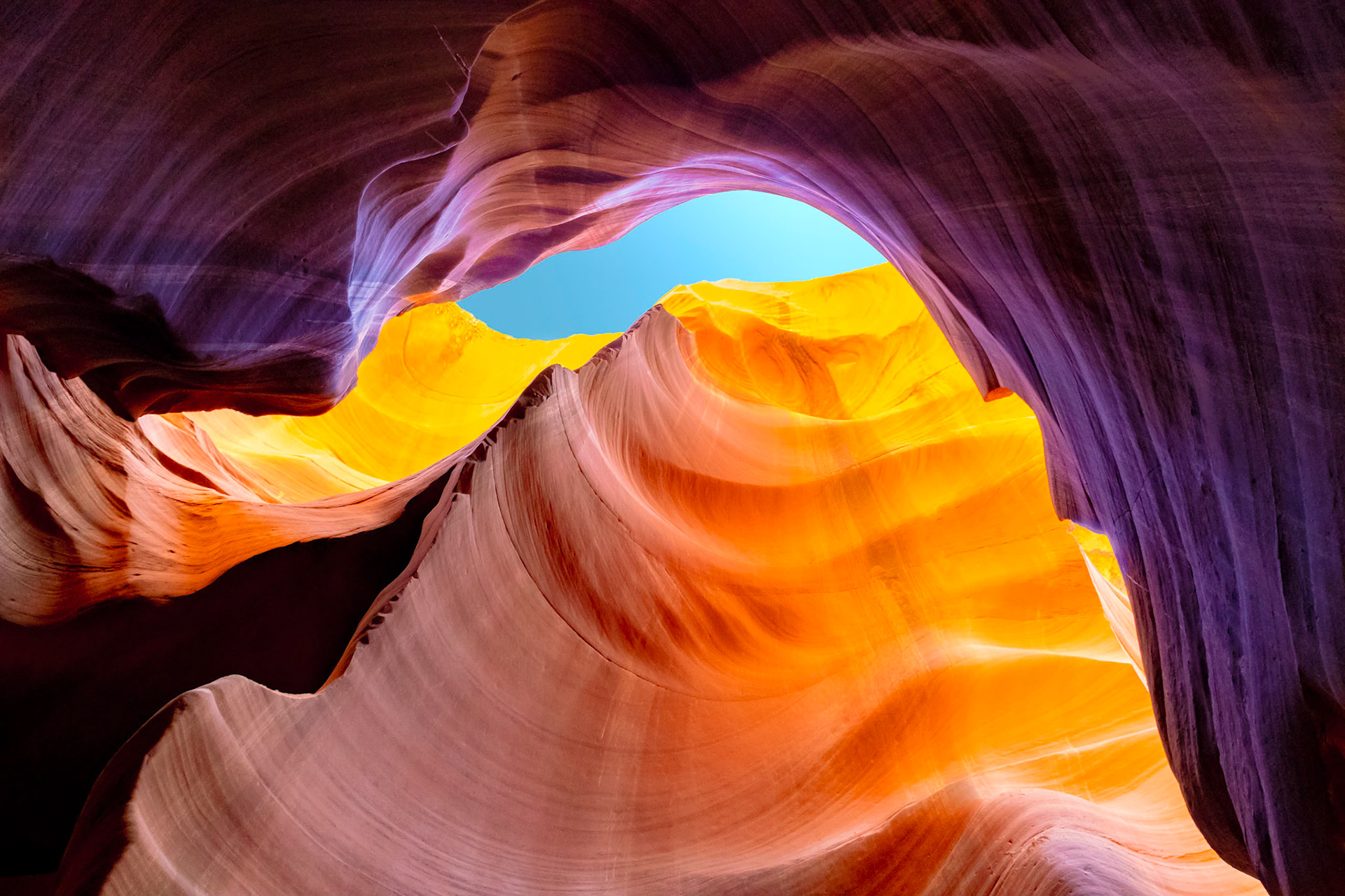 The walls of Antelope Canyon, seemingly in motion like colourful ocean waves.
