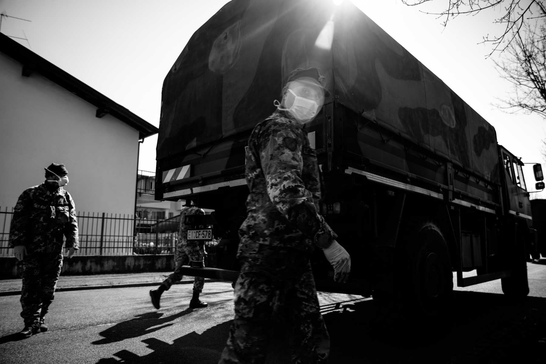 Army getting ready to transport the coffins to the crematory