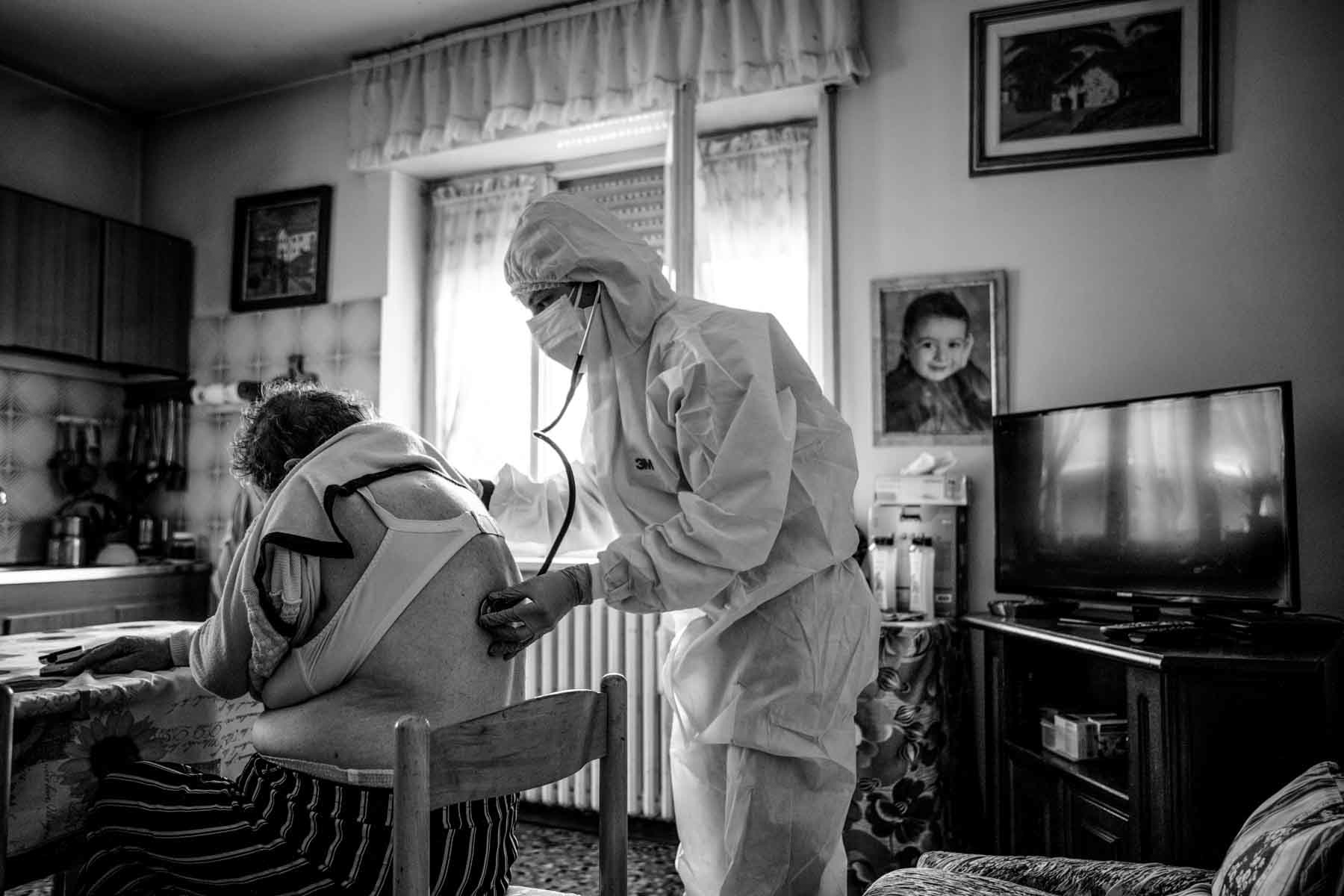 COVID Special Unit family doctor checking on a possible positive patient
