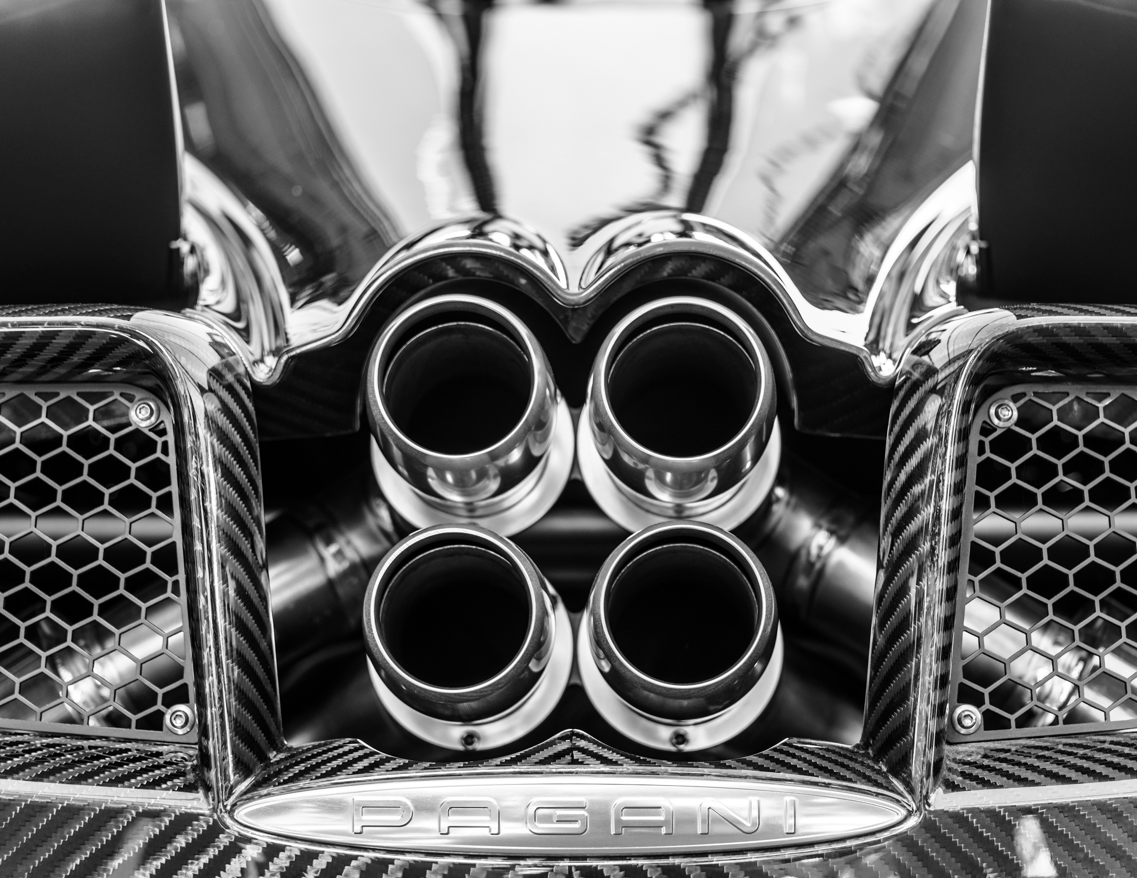 Pagani Huayra titanium exhaust in black and white.